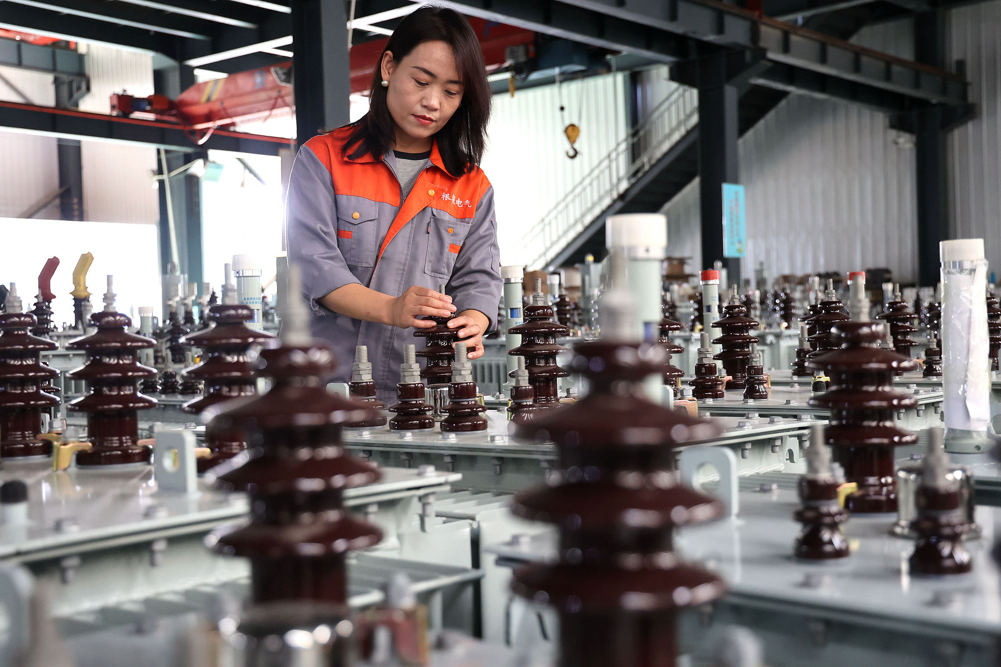 A worker at an electrical euipment production workshop in Binzhou, Shandong Province, China, September 23, 2025. /VCG