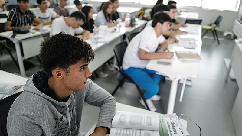 International students take a Chinese lesson at Hainan International College of Beijing Language and Culture University in south China's Hainan Province, September 25, 2025. /VCG