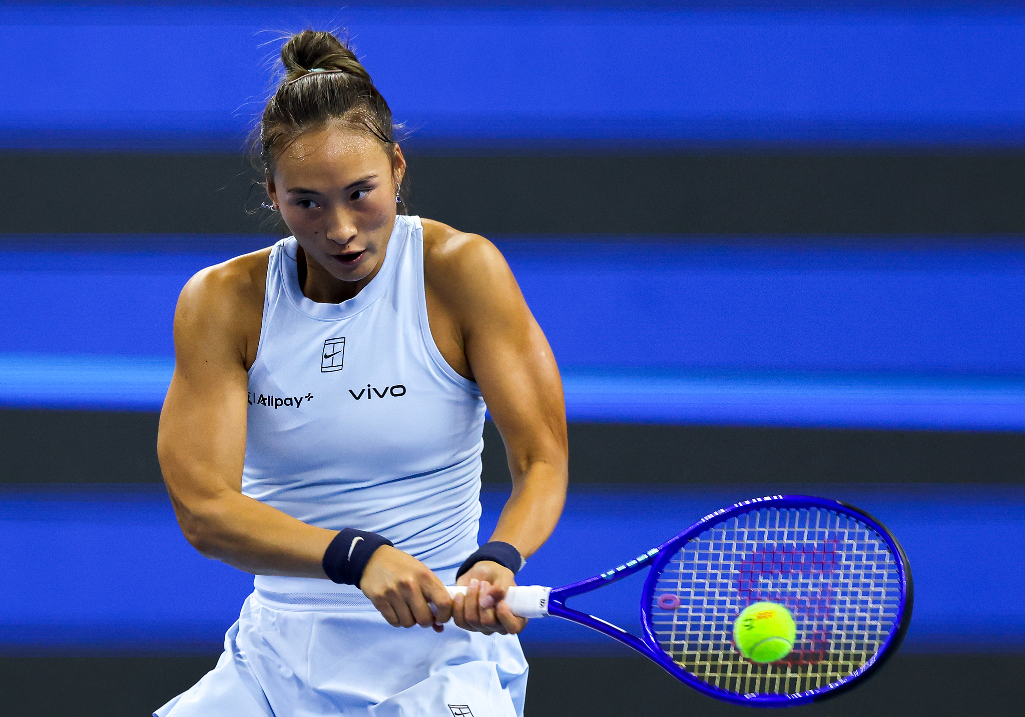 Zheng Qinwen of China hits a shot in the women's singles third-round match against Linda Noskova of the Czech Republic at the China Open in Beijing, September 29, 2025. /VCG