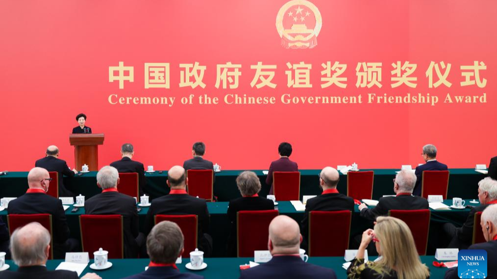 Chinese State Councilor Shen Yiqin delivers a speech at the Ceremony of the 2025 Chinese Government Friendship Award at the Great Hall of the People in Beijing, capital of China, September 30, 2025. /Xinhua