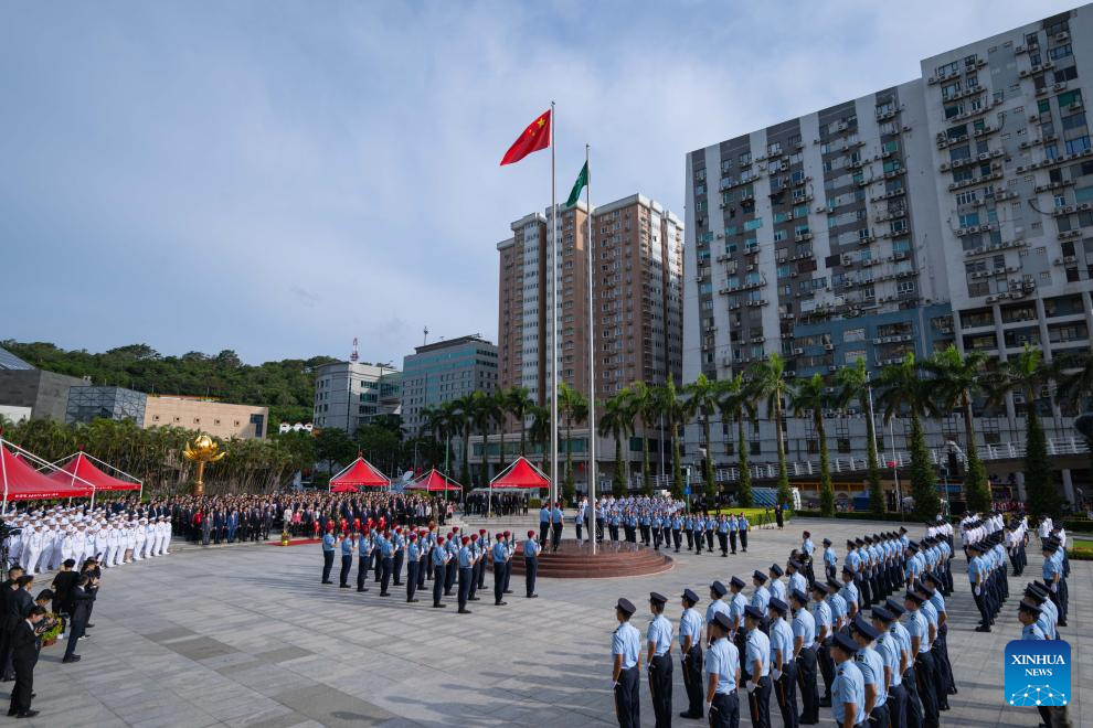 A flag-raising ceremony marking the 76th anniversary of the founding of the People's Republic of China is held at the Golden Lotus Square in south China's Macao SAR, October 1, 2025. /VCG