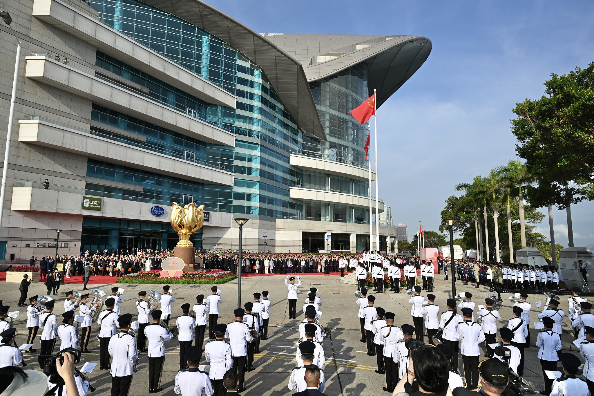 A flag-raising ceremony marking the 76th anniversary of the founding of the People's Republic of China is held at the Golden Bauhinia Square in south China's Hong Kong SAR, October 1, 2025. /VCG