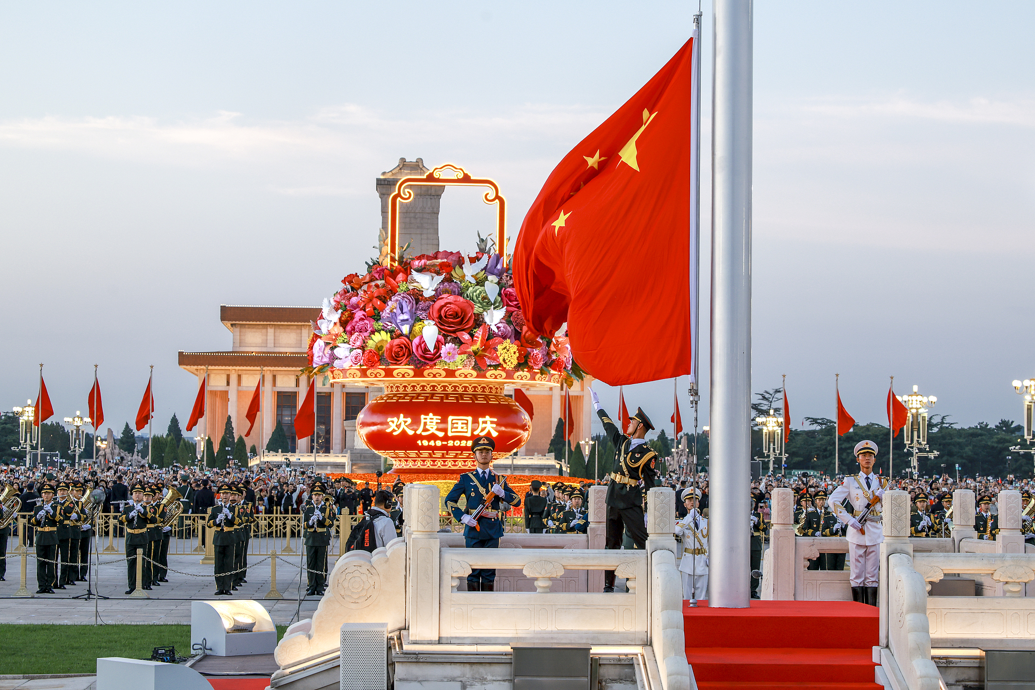 A flag-raising ceremony marking the 76th anniversary of the founding of the People's Republic of China is held at Tiananmen Square in Beijing, capital of China, October 1, 2025. /VCG