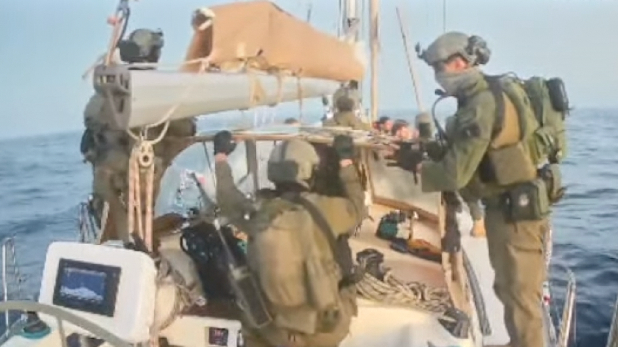 This frame from video released by the Global Sumud Flotilla shows Israeli navy soldiers aboard one of the flotilla's vessels after it was intercepted as it approached the coast of Gaza, October 2, 2025. /VCG