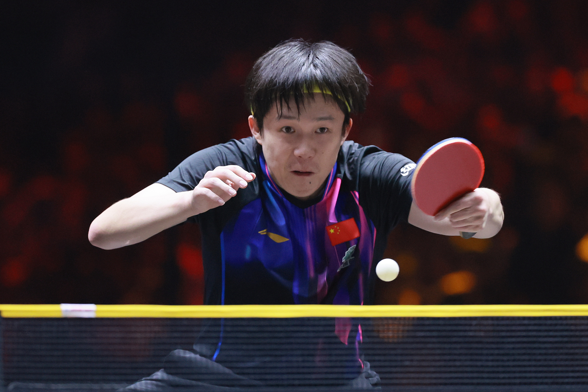 Wang Chuqin of China hits a shot in the men's singles round of 16 match against An Jae-hyun of South Korea at the World Table Tennis (WTT) China Smash in Beijing, October 2, 2025. /VCG