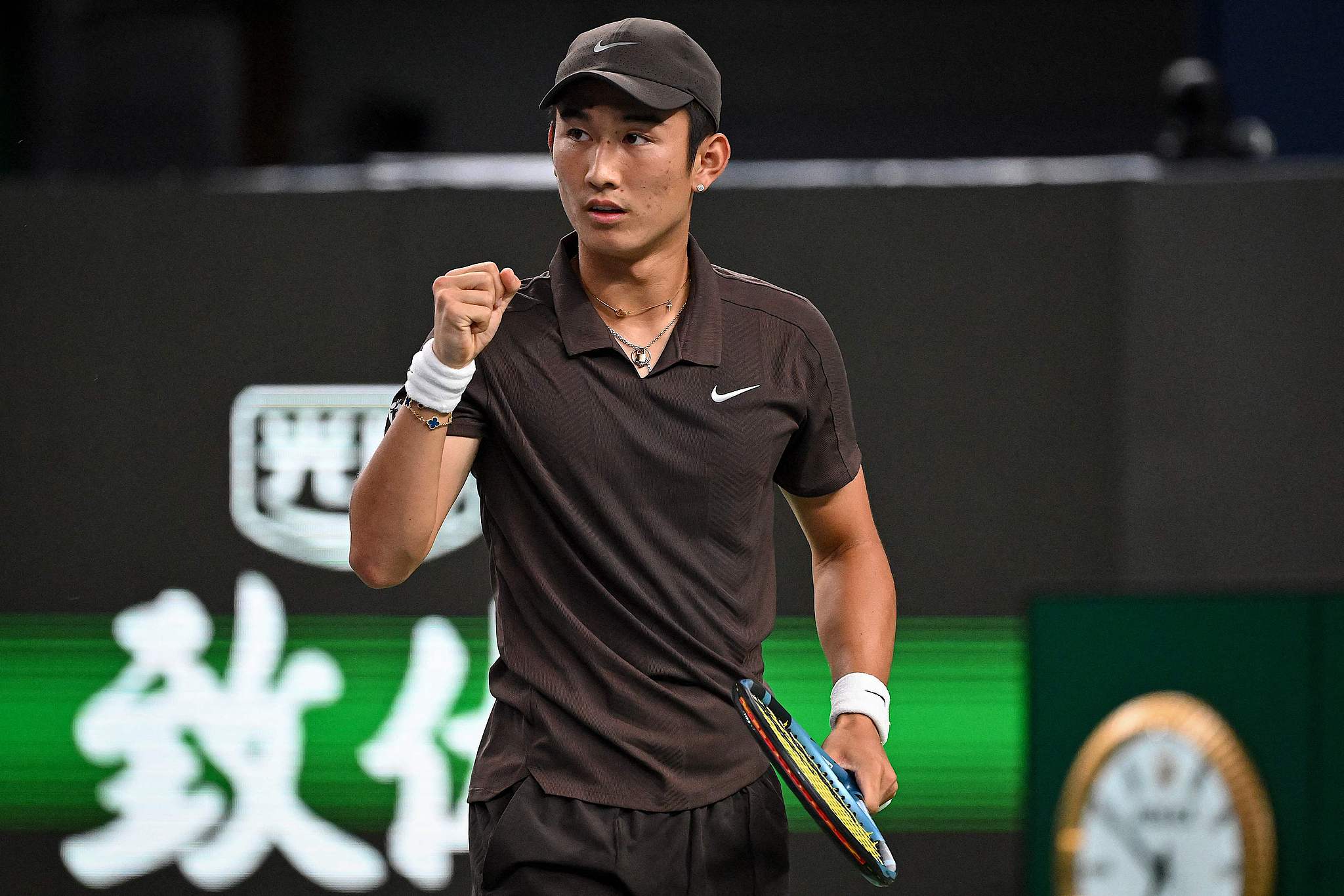 Shang Juncheng of China reacts to scoring a point in the men's singles first-round match against Aleksandar Kovacevic of the United States at the Shanghai Masters in east China's Shanghai Municipality, October 2, 2025. /VCG