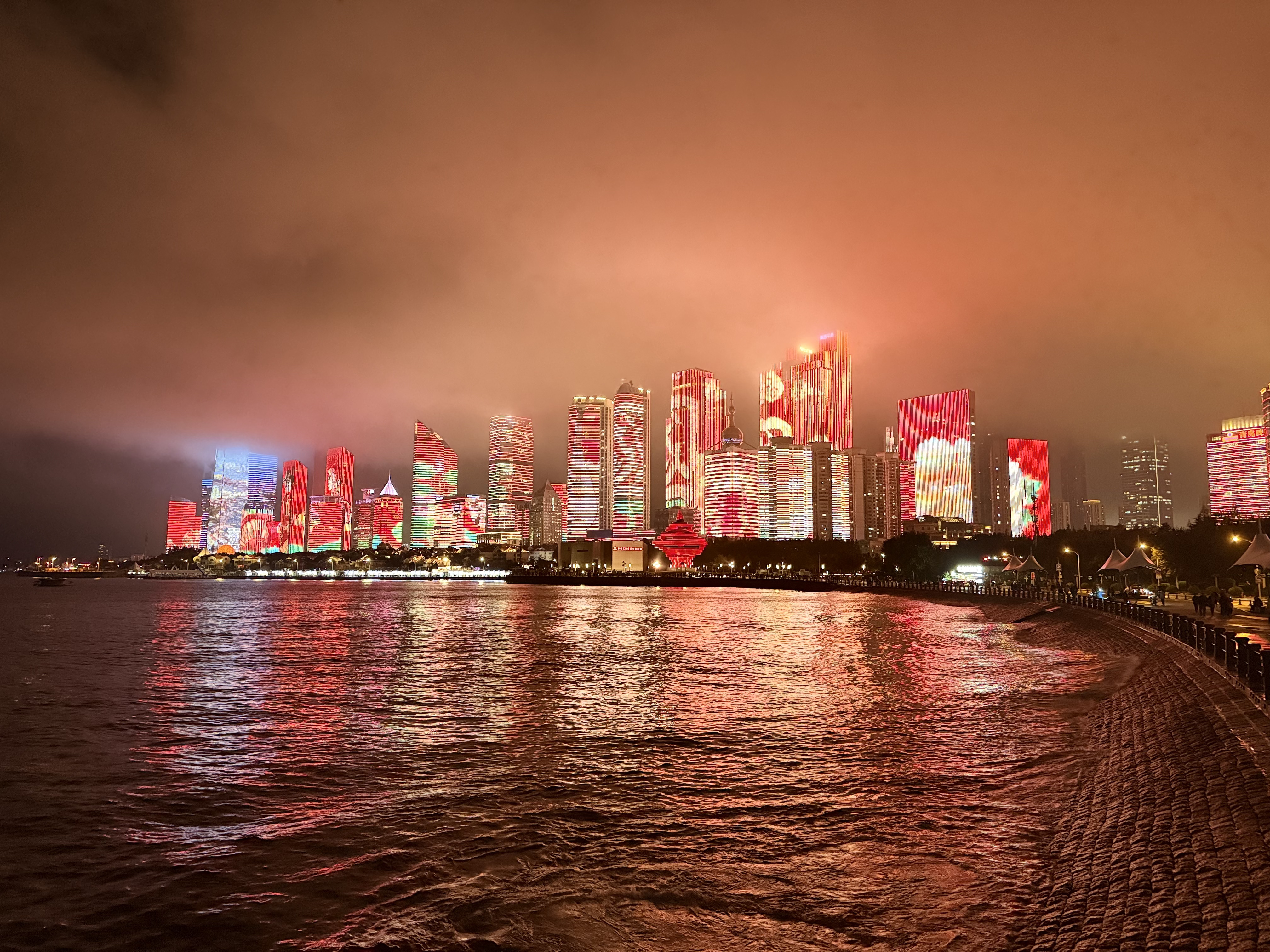 Qingdao's illuminated skyline reflected in the sea, September 2025, Qingdao, China /Zaruhi Poghosyan
