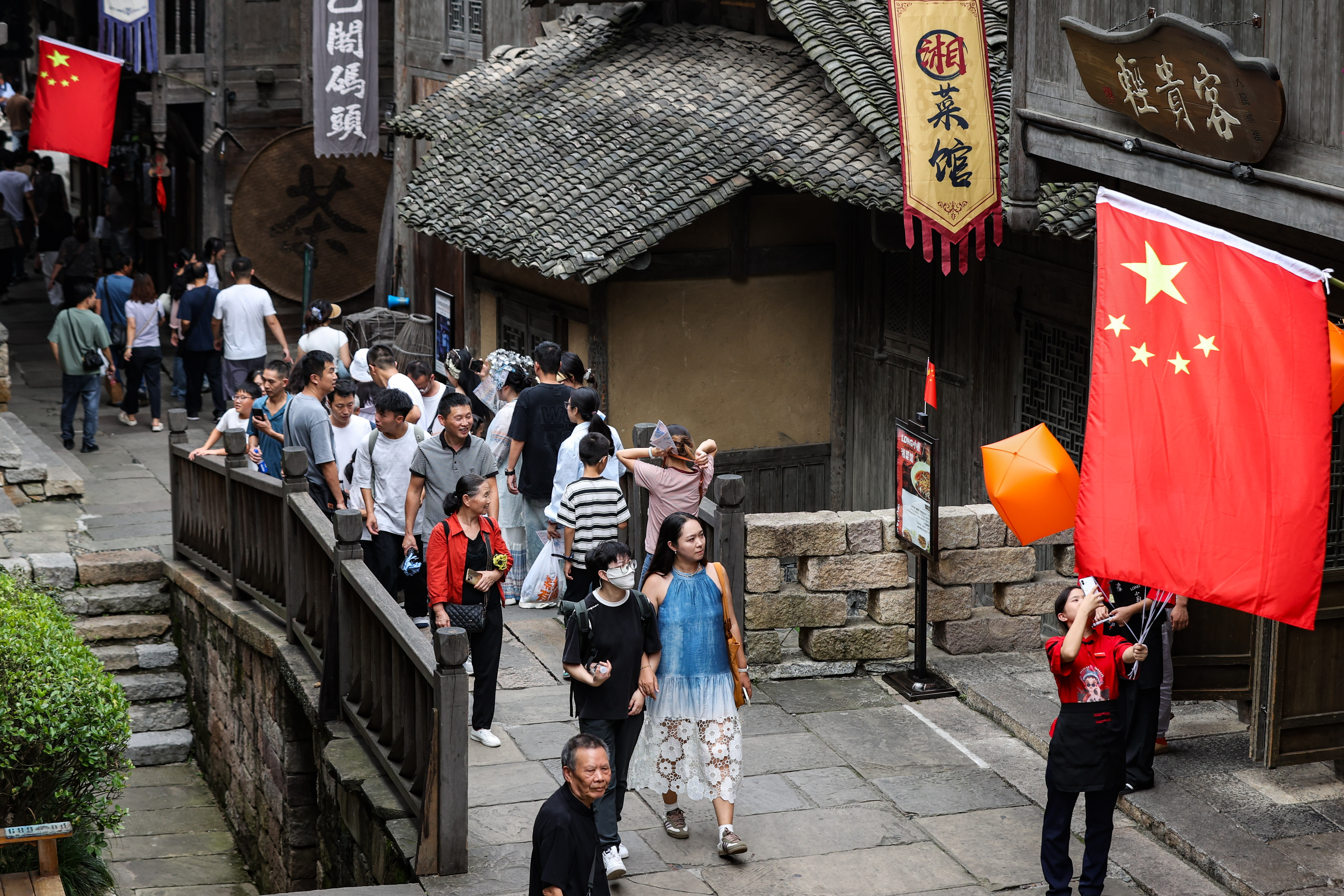 Tourists visit Wujiang Village in the Bozhou District of Zunyi City, Guizhou Province on October 4, 2025. /IC