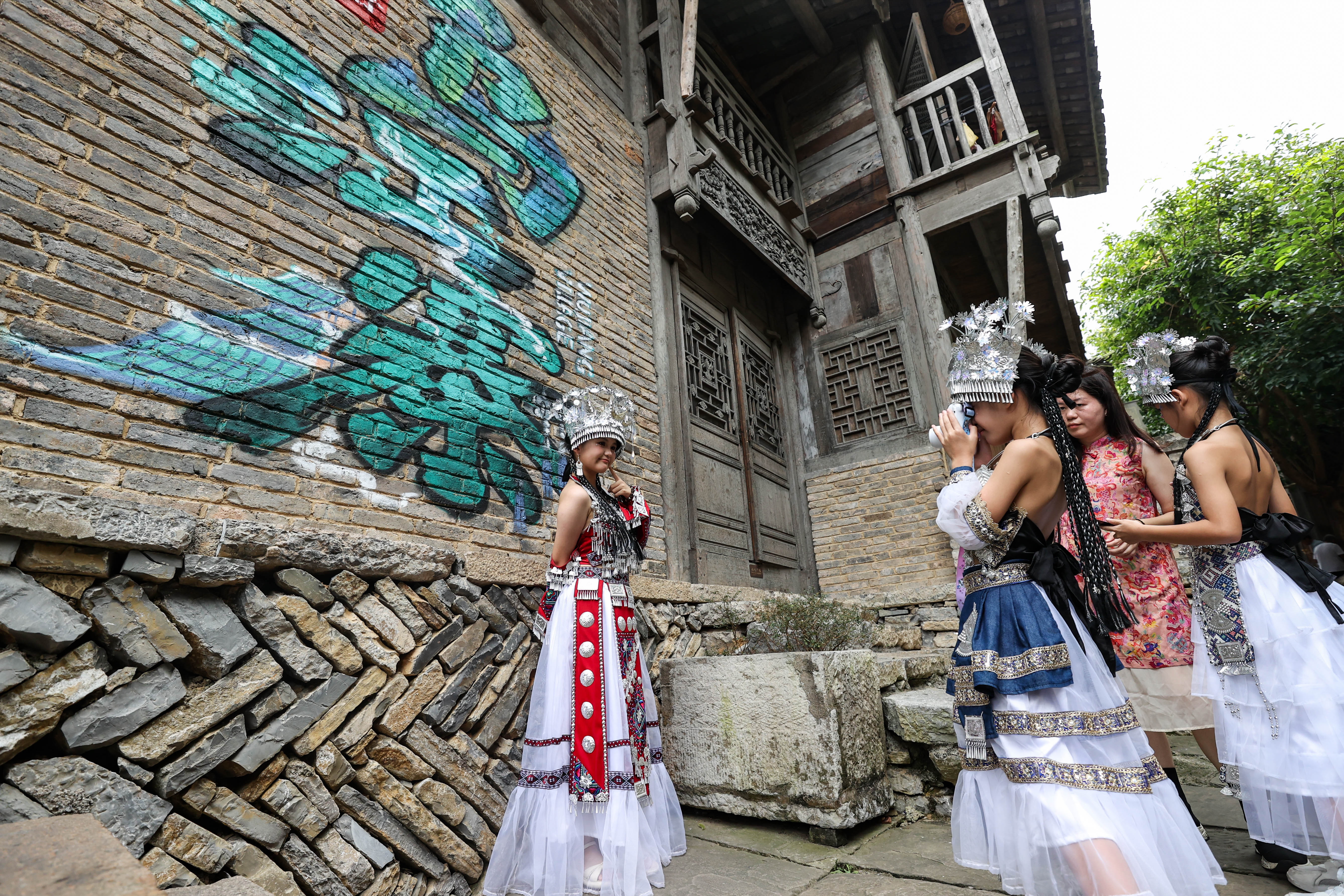 Tourists visit Wujiang Village in the Bozhou District of Zunyi City, Guizhou Province on October 4, 2025. /IC