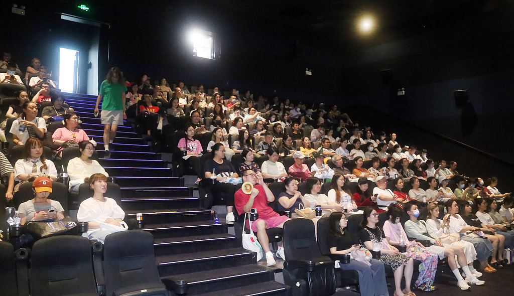 People watch films at a cinema in Shanghai, on October 3, 2025. /CFP