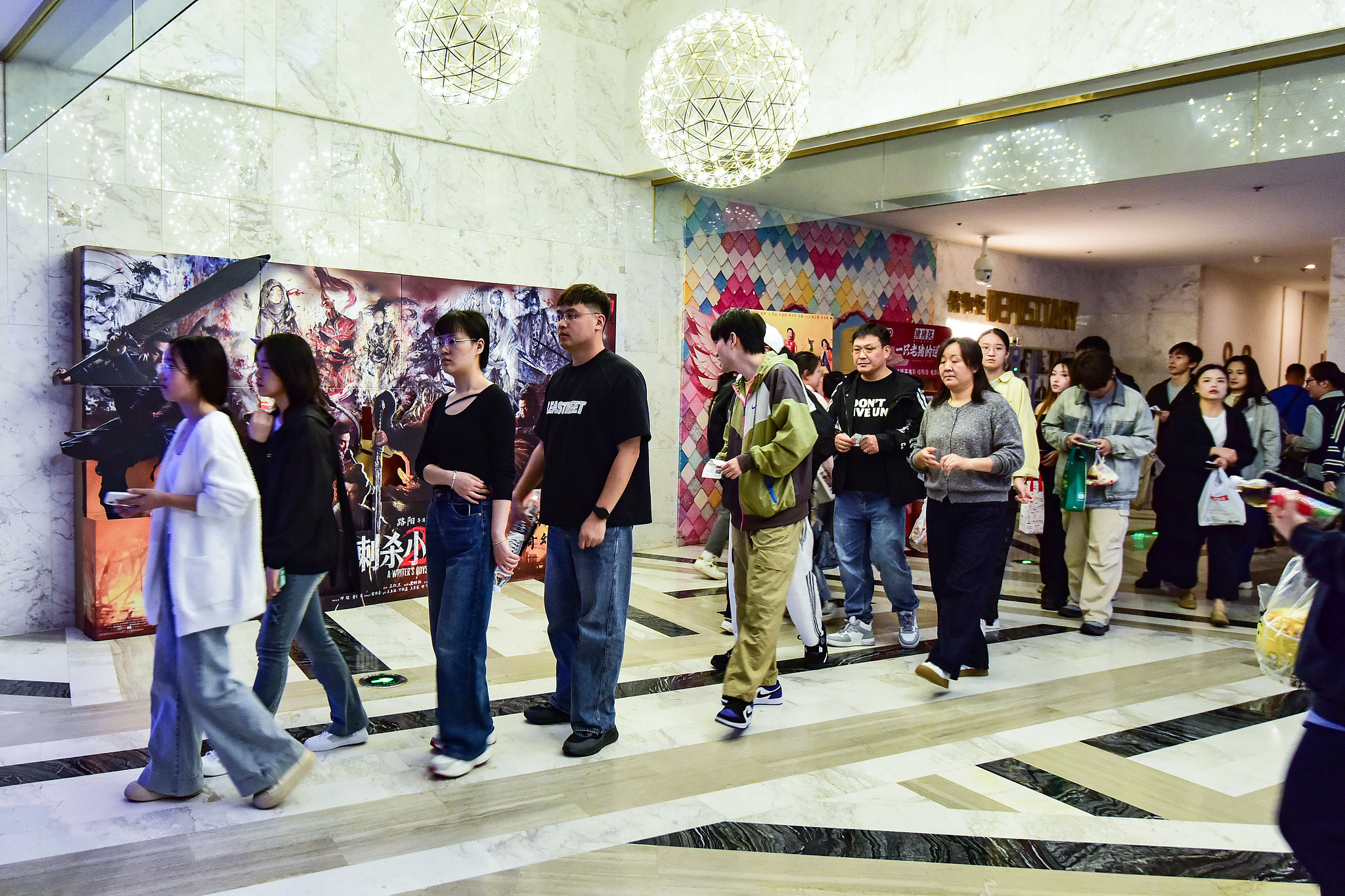 Moviegoers entering a film theater in Zhuoyang, Anhui Province, China, October 3, 2025. /VCG