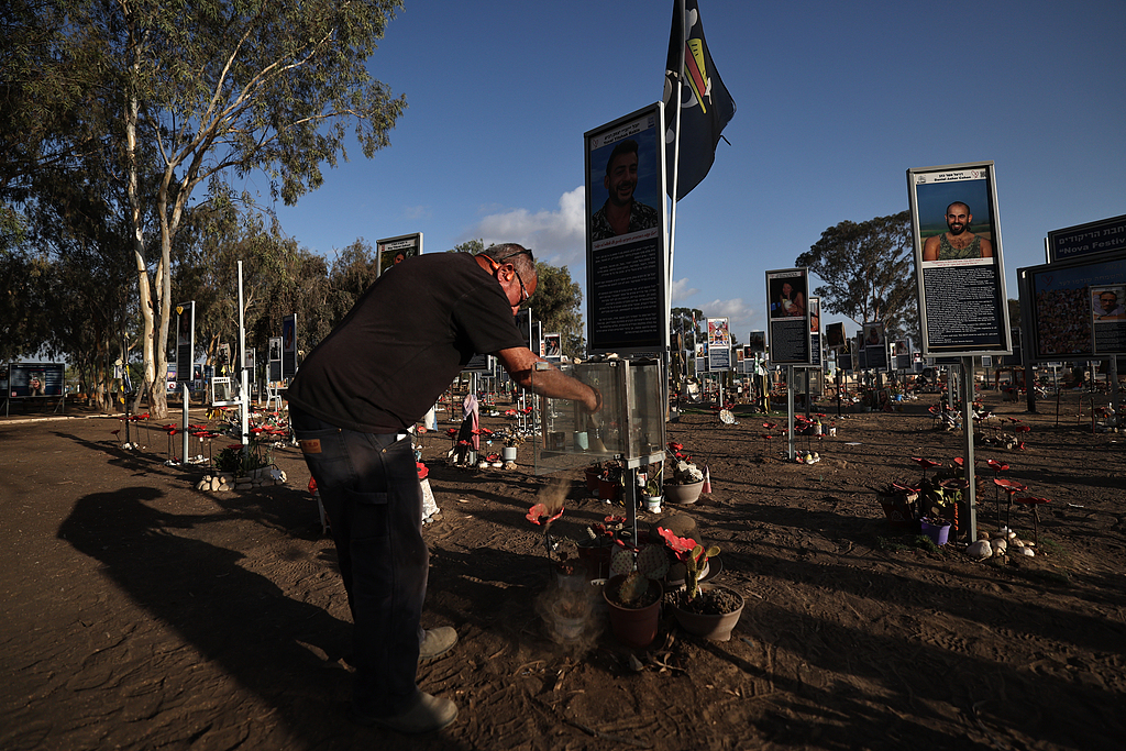 A man named Jojo Rabia attends the memorial of his son at the site of the Nova music festival, near Re'im, near the Gaza border, southern Israel, October 6, 2025. /VCG