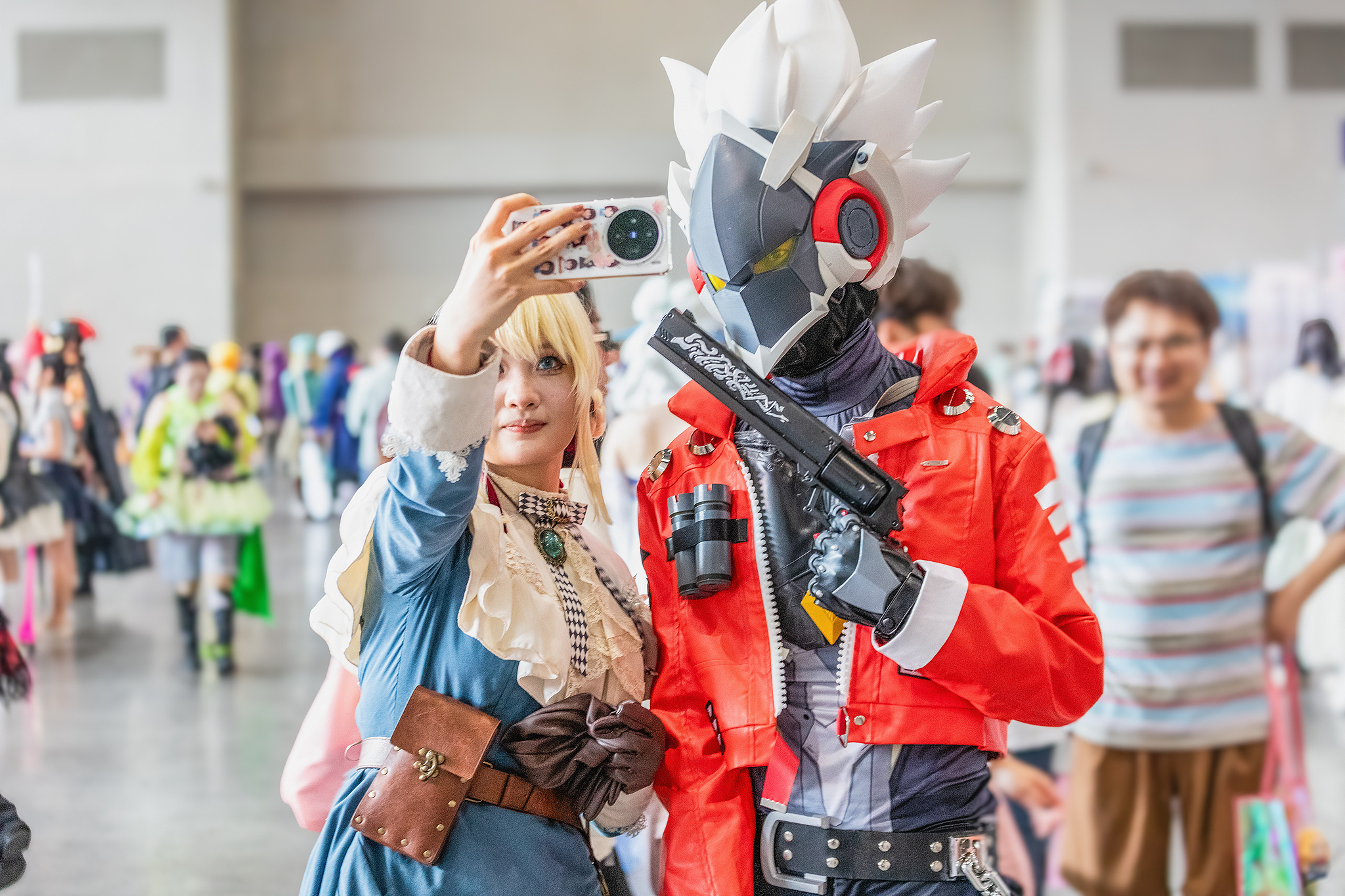 Two cosplayers take a photo of themselves at the China Western Animation Culture Festival at Chongqing City, southwest China, October 1, 2025. /CFP