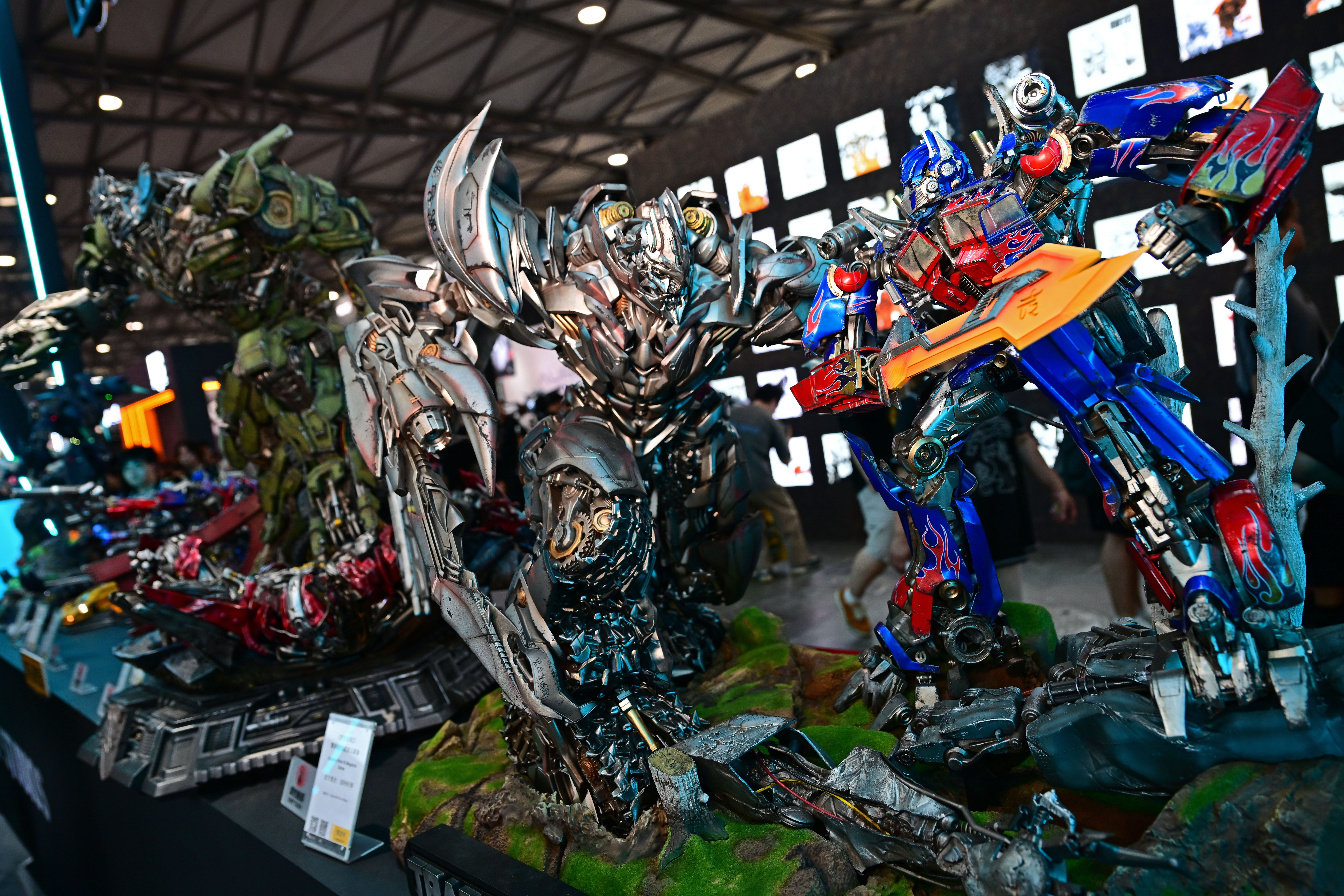 Three delicate Transformers series models are displayed at WF 2025 in Shanghai, east China, October 2, 2025. /CFP