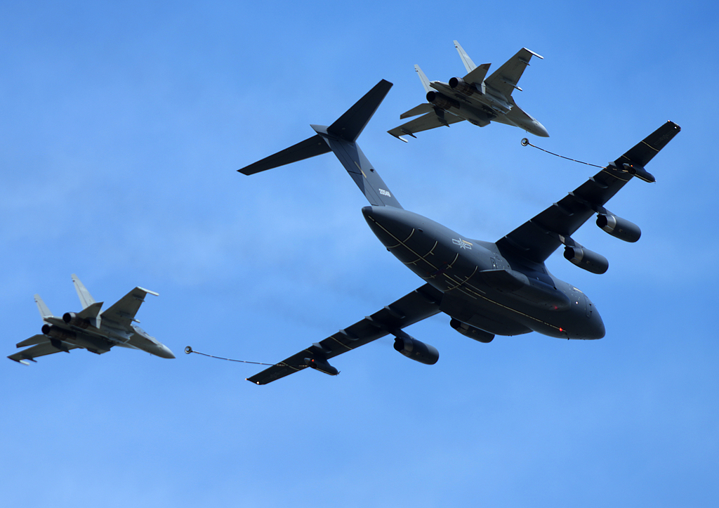 Two J-16 fighter jets fly with a YY-20, China's next-generation aerial refueling aircraft, at the Changchun Air Show in Changchun, northeast China's Jilin Province, September 19, 2025. /VCG