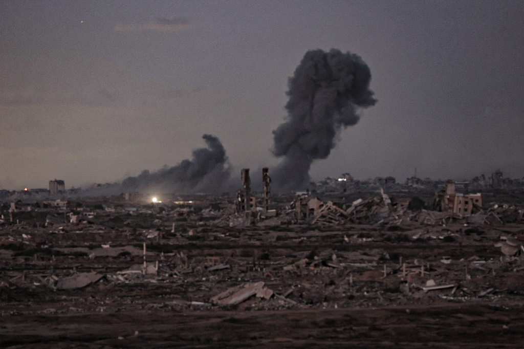 Smoke rises from the area after Israeli air strikes targeted areas in the Gaza Strip despite the announcement of a ceasefire agreement, Gaza City, Gaza, October 9, 2025. /VCG