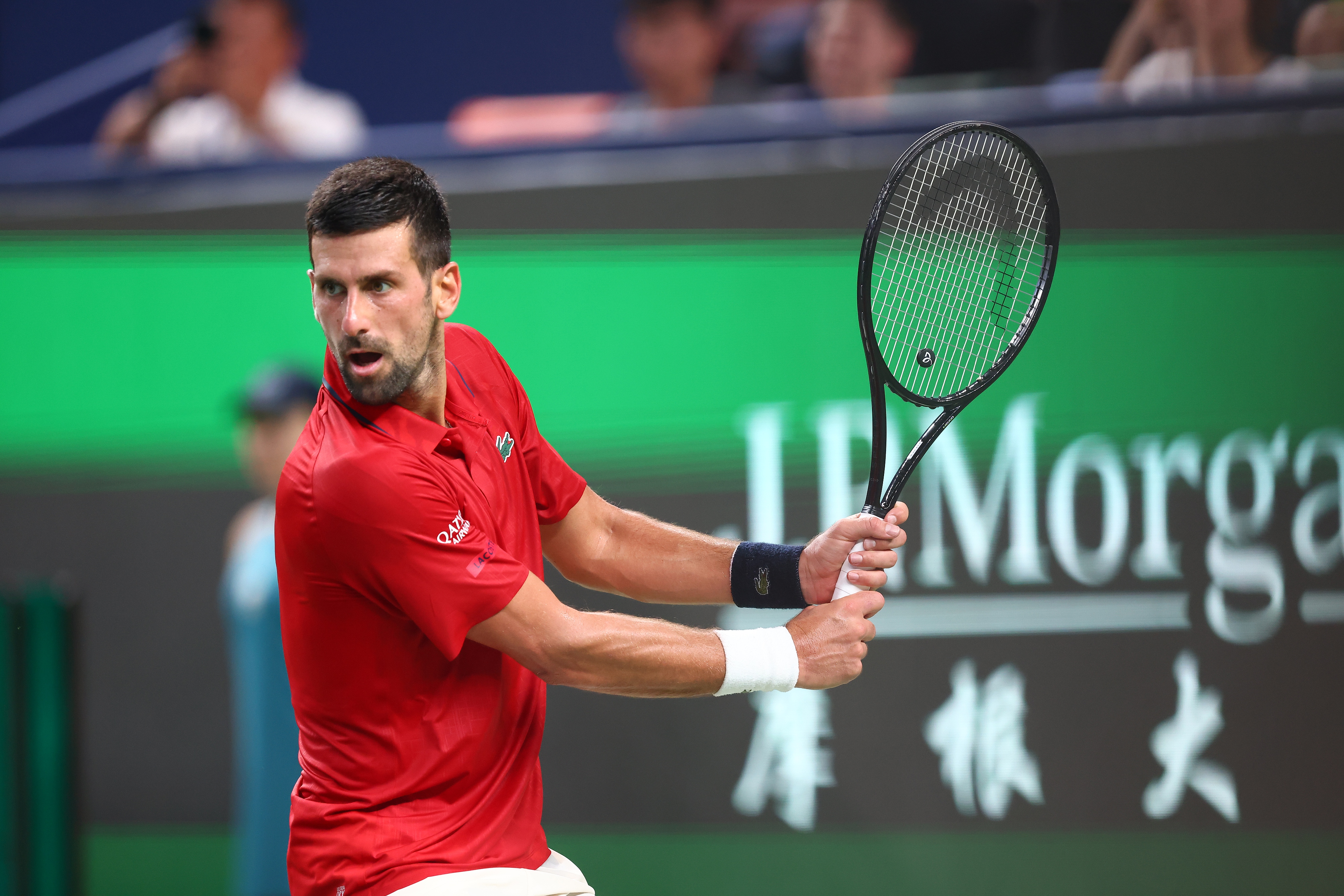 Serbia's Novak Djokovic prepares to hits a shot against Monaco's Valentin Vacherot in a men's singles semifinal match at the Shanghai Masters in Shanghai, China, October 11, 2025. /VCG
