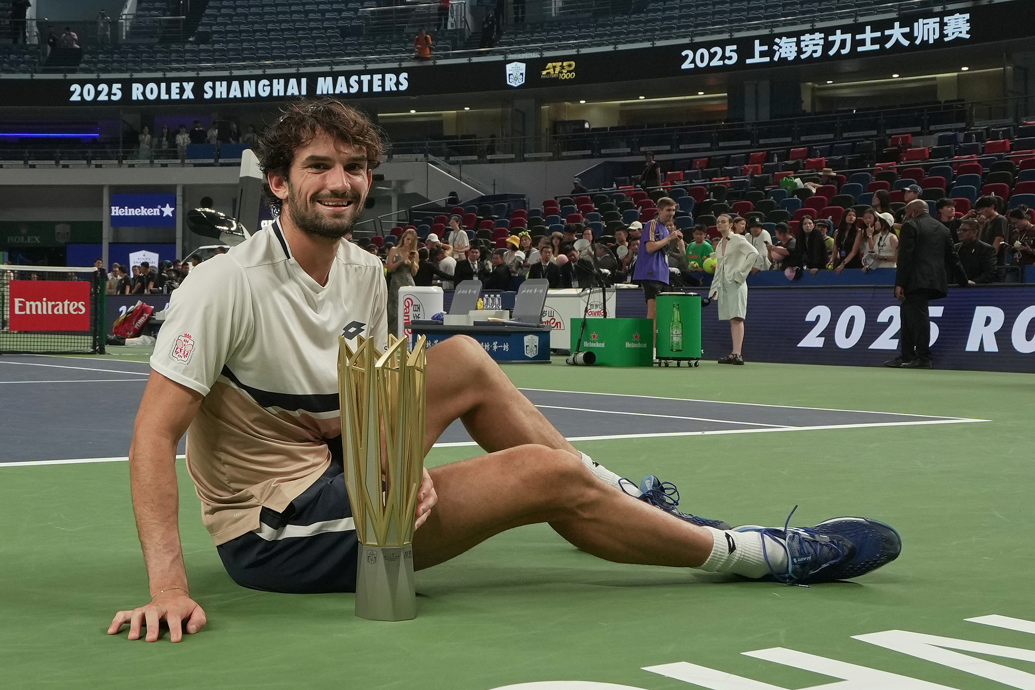 Valentin Vacherot of Monaco poses with the championship trophy after beating Arthur Rinderknech of France in the men's singles final at the Shanghai Masters in Shanghai, China, October 12, 2025. /VCG