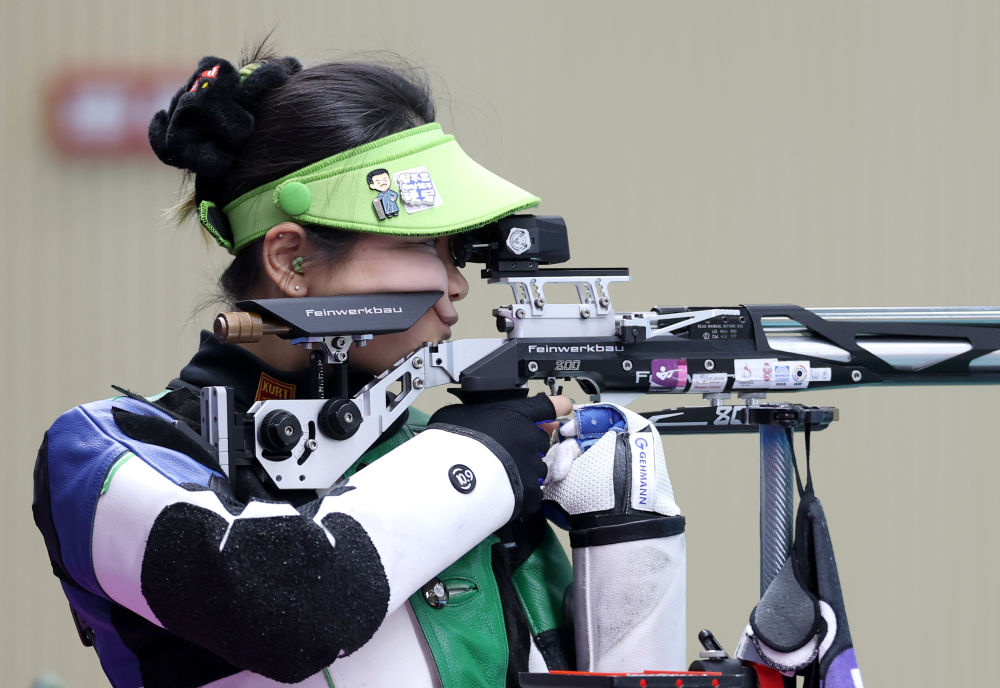 Han Jiayu competes in the women's 10-meter air rifle final at the 15th National Games of China in south China's Guangdong Province, October 13, 2025. /Xinhua