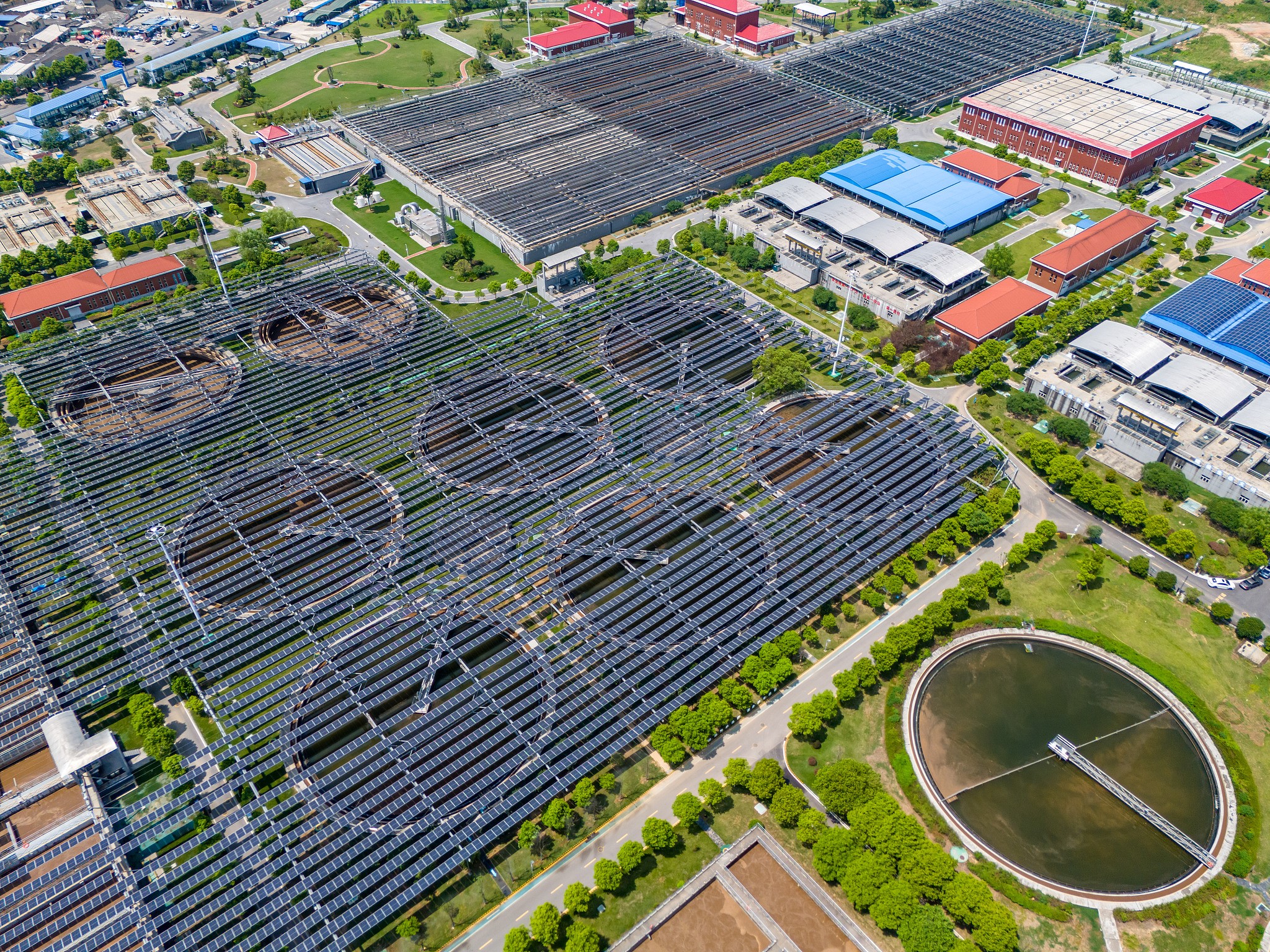 Solar panel arrays cover sewage treatment facilities in Changsha City, central China's Hunan Province, September 7, 2025. /VCG