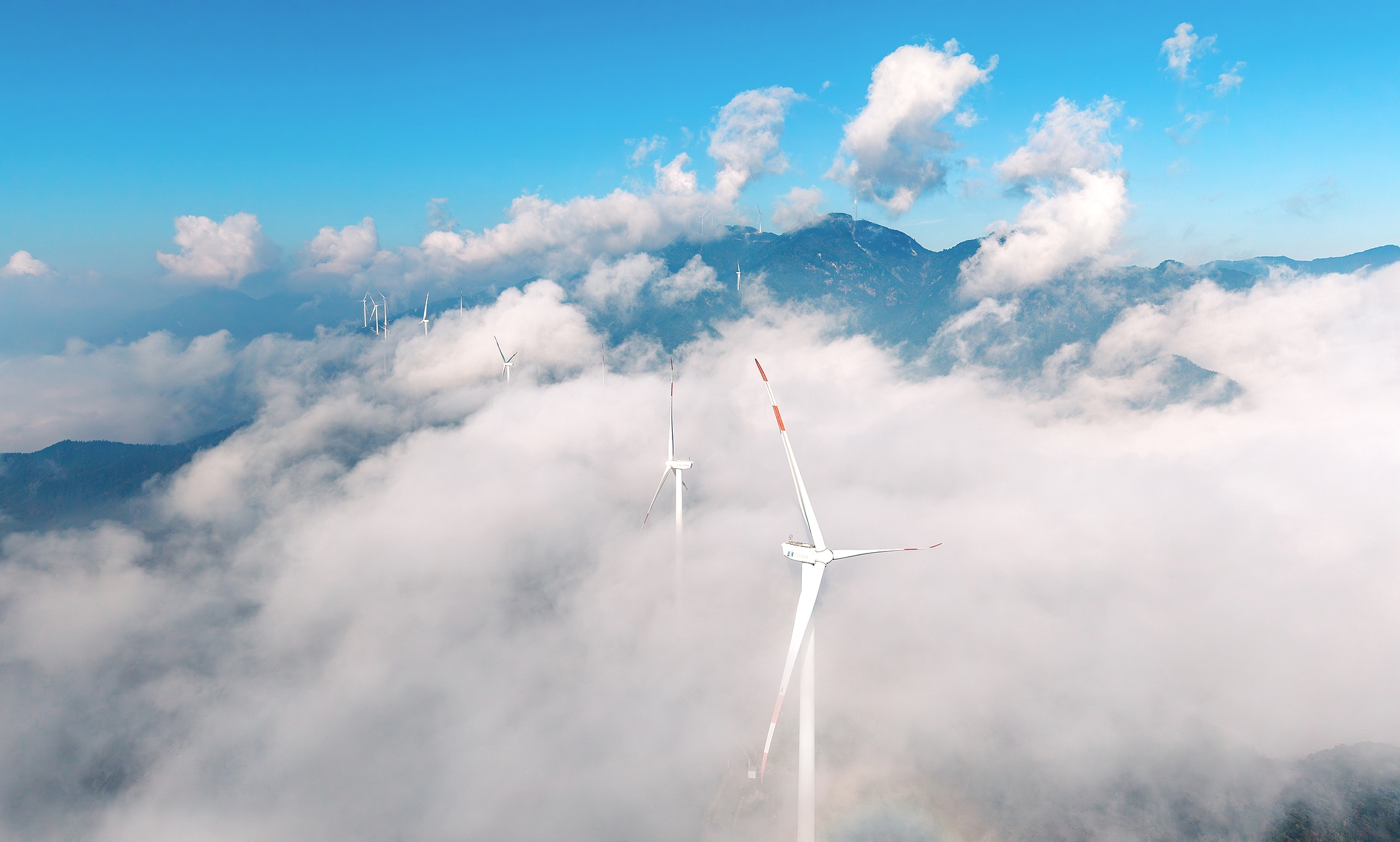 Wind turbines run near Anqing City, east China's Anhui Province, October 7, 2025. /VCG