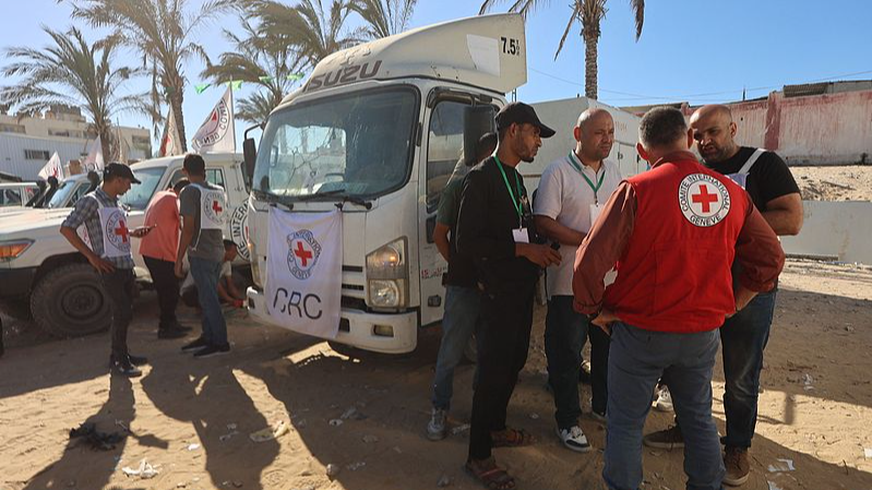 Aid trucks roll into Gaza as dispute over hostage bodies is paused