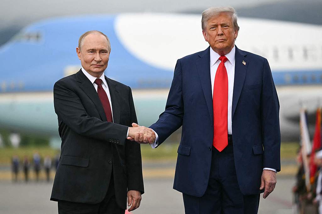 U.S. President Donald Trump greets Russian President Vladimir Putin at Joint Base Elmendorf-Richardson in Anchorage, Alaska, August 15, 2025. /VCG