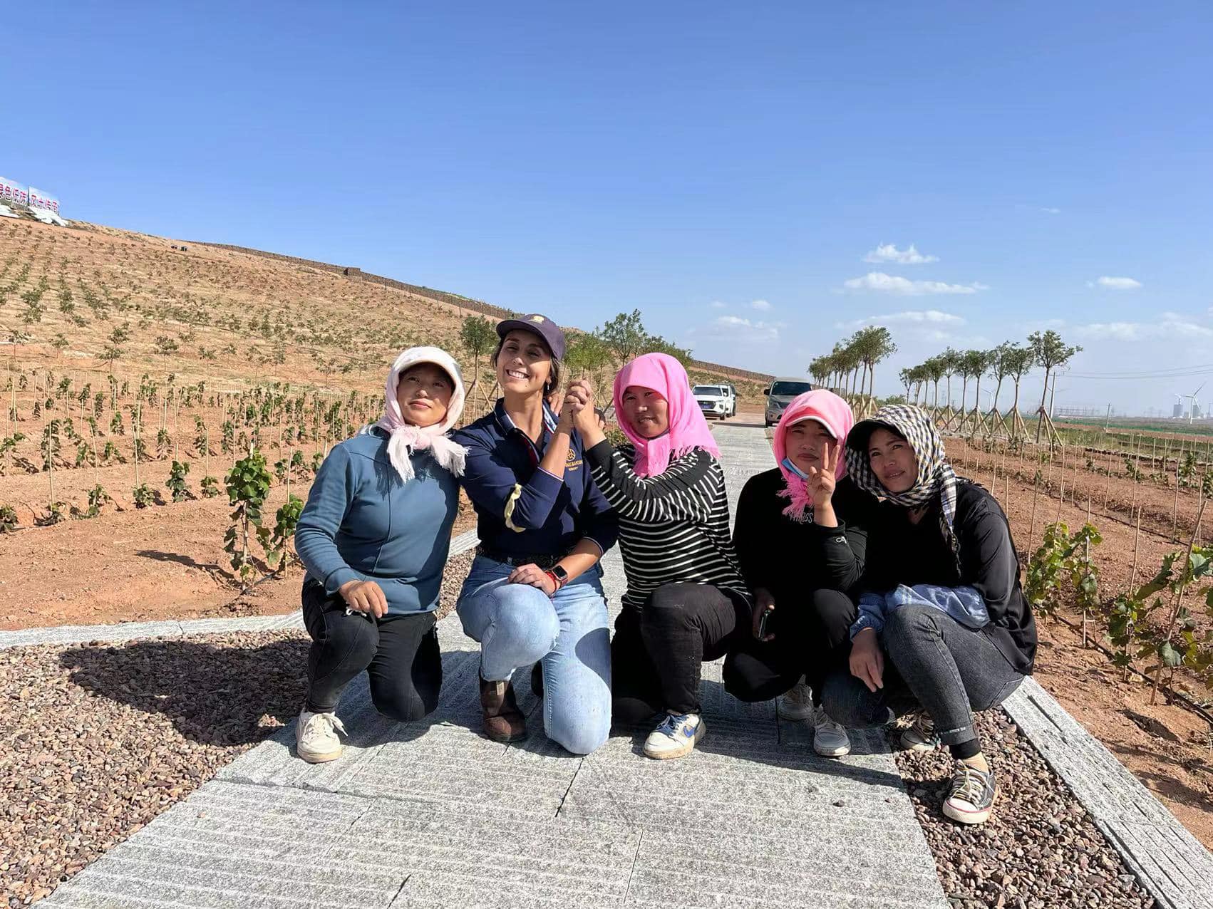 Maria Ponce with her Chinese colleagues in a grapes planting field in Ningxia Hui Autonomous Region, China, October 7, 2022. /Maria Ponce's personal social media account