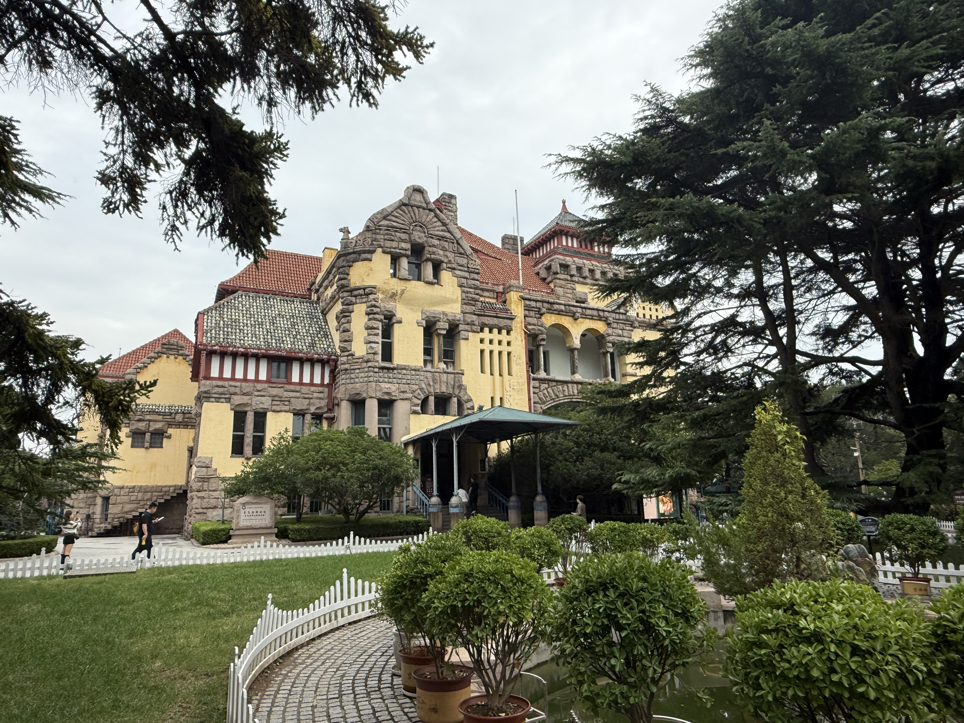 The Former German Governor's Residence rising above the treetops, Qingdao, September 2025. Zaruhi Poghosyan/ CGTN