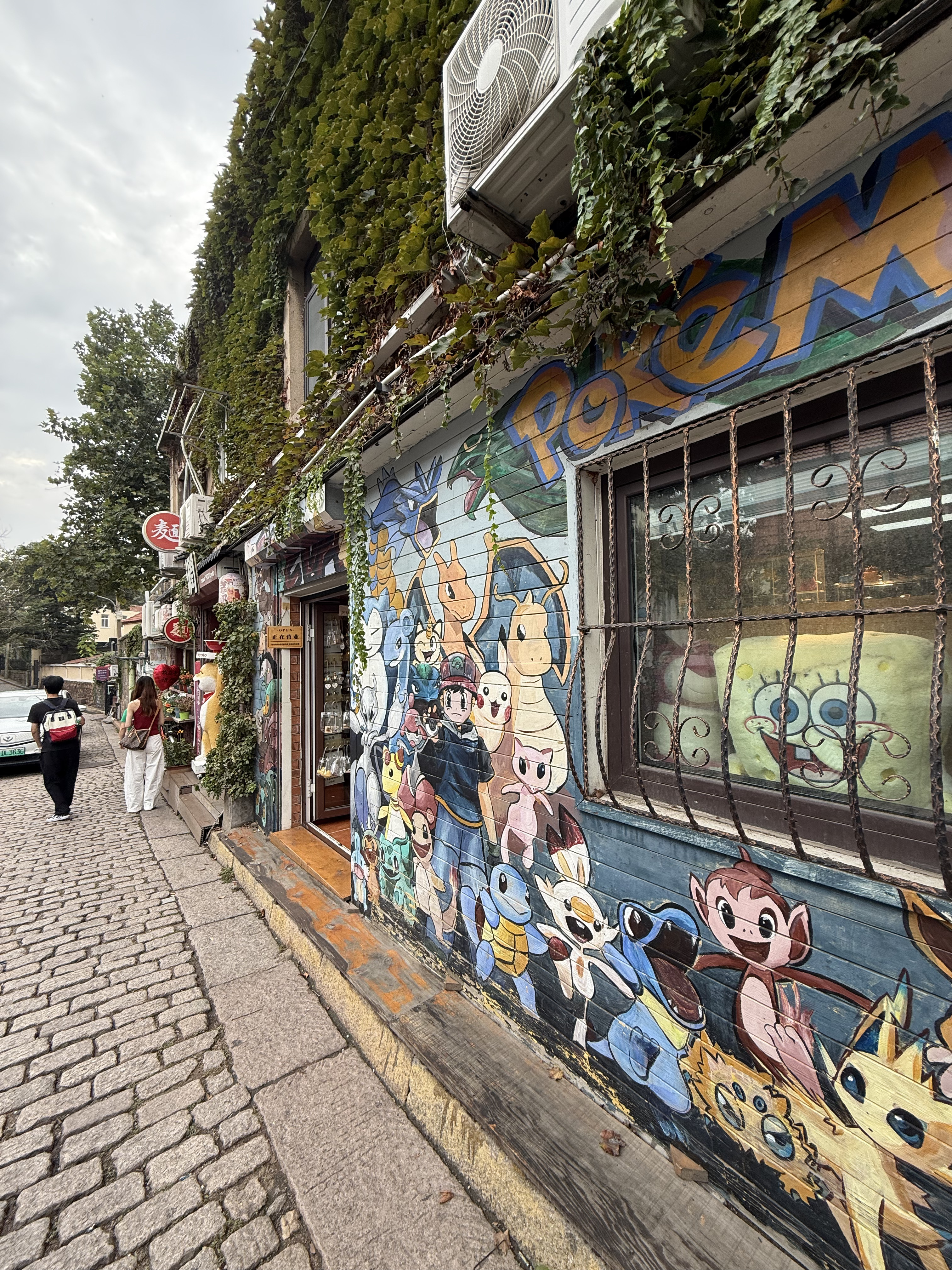 Paintings as seen on Qingdao University Road Anime Wall, Qingdao, September 2025. Zaruhi Poghosyan/ CGTN