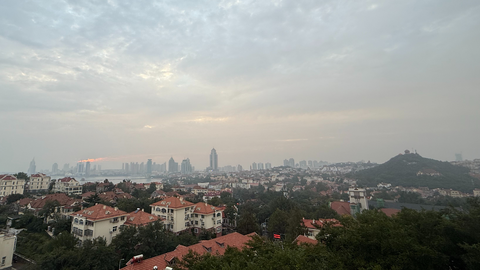 From red roofs to crimson sunsets: Walking Qingdao's hills of memory