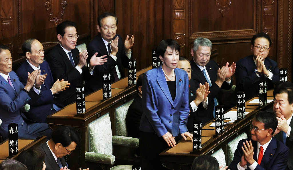 Sanae Takaichi stands after the prime ministerial nomination election during the House of Representatives plenary session, Tokyo, Japan, October 21, 2025. /VCG