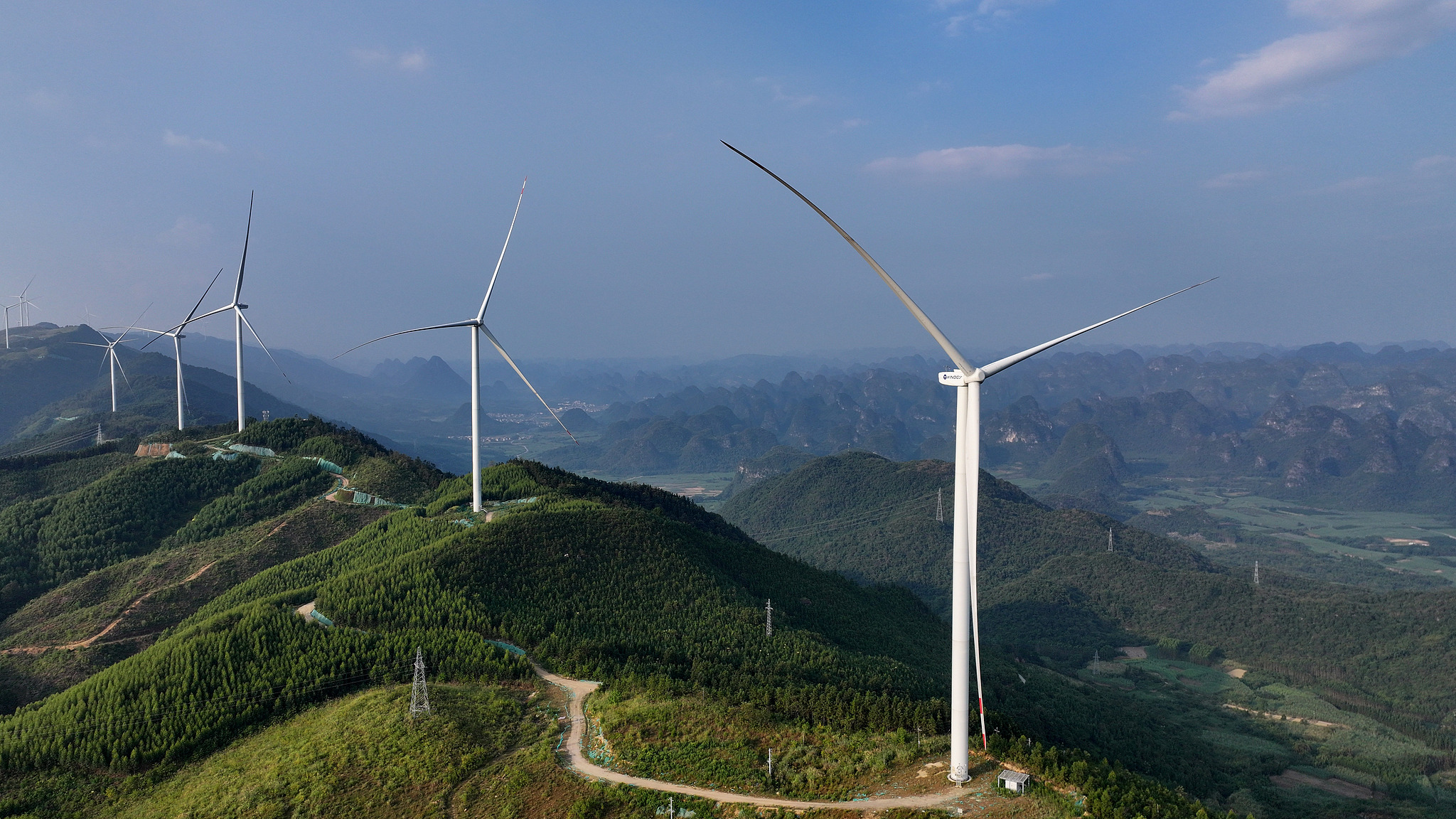 View of wind turbines on a stretch of mountains in China's Guangxi Zhuang Autonomous Region, October 11, 2025. /VCG
