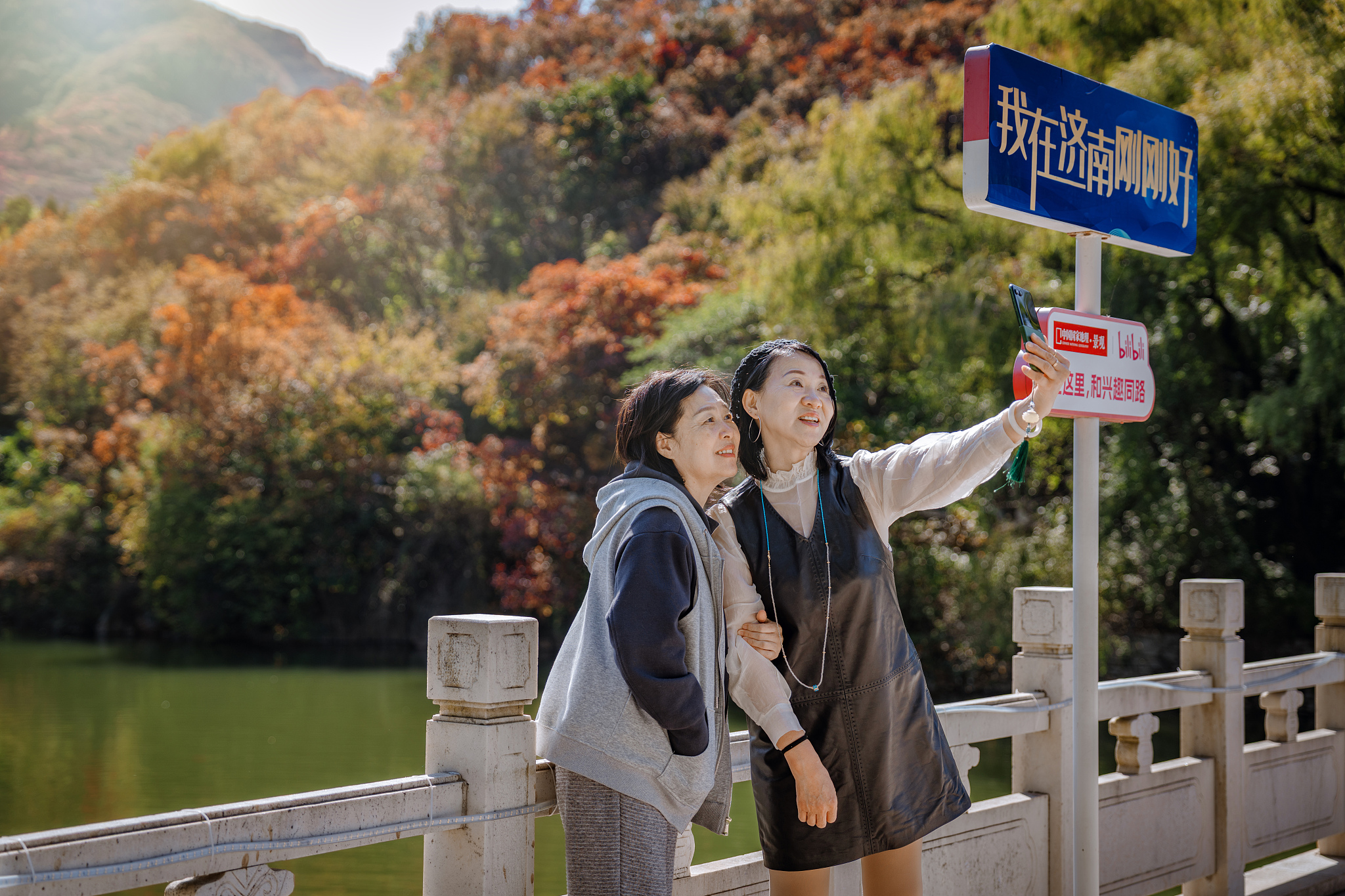People visit the Red Leaves Canyon Scenic Area in Jinan, Shandong Province, on October 21, 2025. /VCG