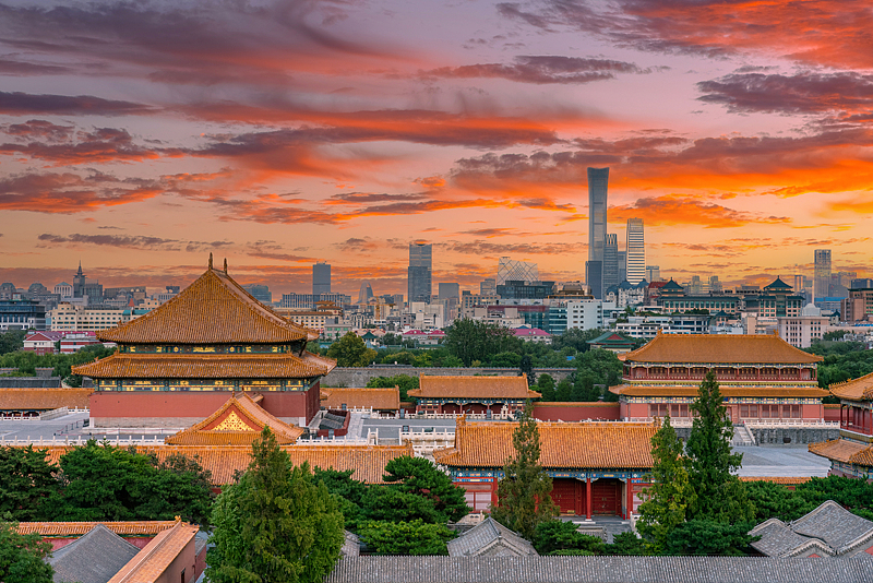 Sunrise over the Forbidden City in Beijing, China. /VCG