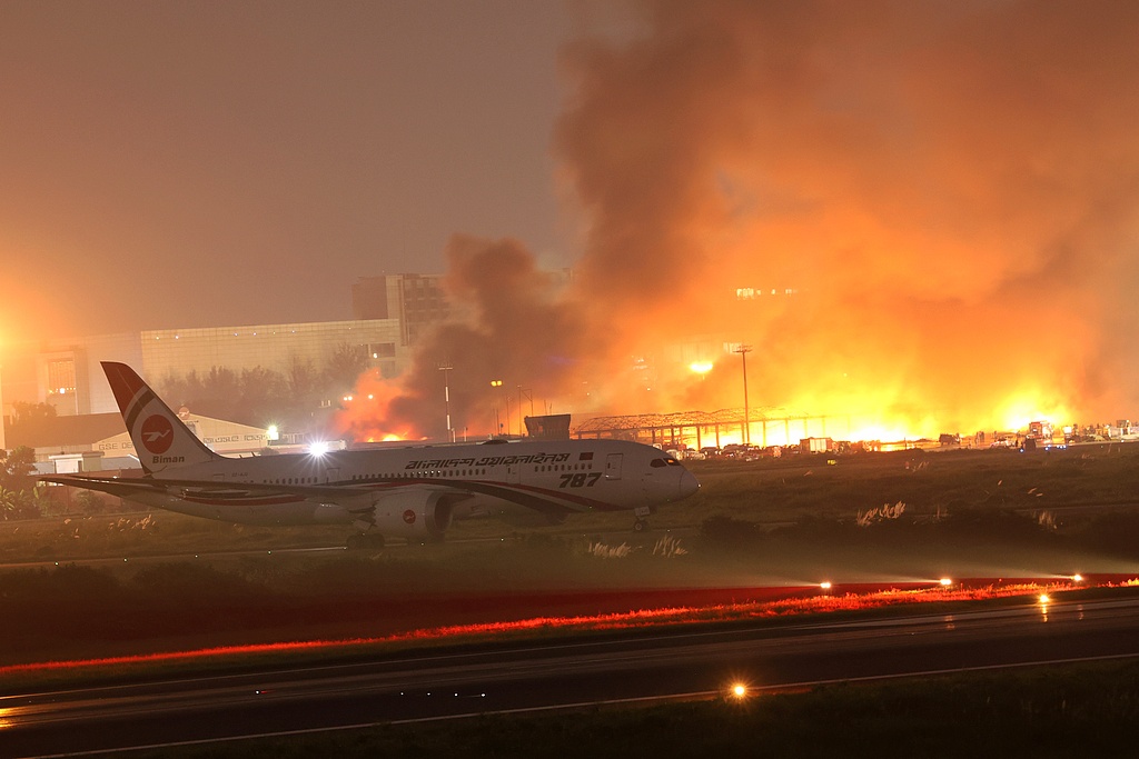 A fire breaks out at the cargo village of Hazrat Shahjalal International Airport in Dhaka, Bangladesh, on October 18, 2025. /CFP