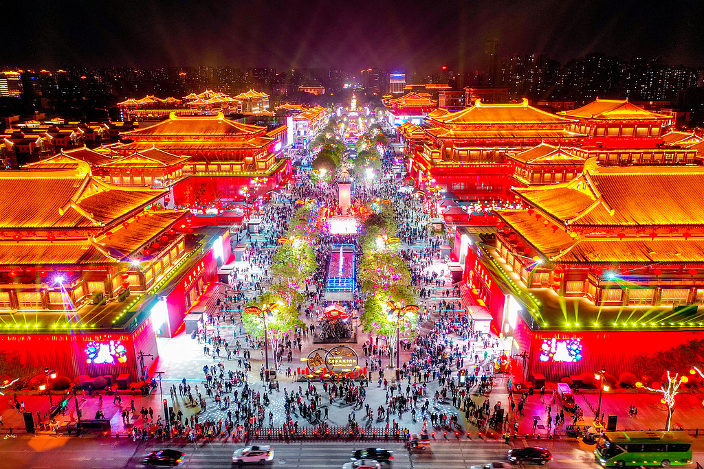 An aerial photo from 2022 shows the Tang Dynasty-themed block in Xi'an, dazzling with performances, open-air shows and bustling night bazaars. /VCG