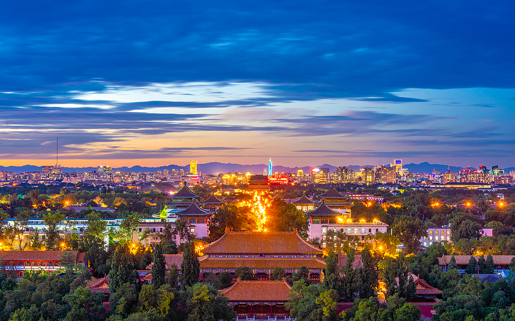 Blending heritage and cityscape, the Central Axis is seen aglow at sunset in Beijing on September 5, 2024. /VCG