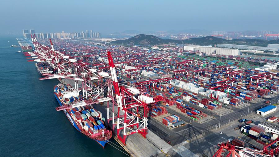 Cargo ships berthing at a container dock of Qingdao Port in Qingdao, east China's Shandong Province, April 30, 2025. /Xinhua