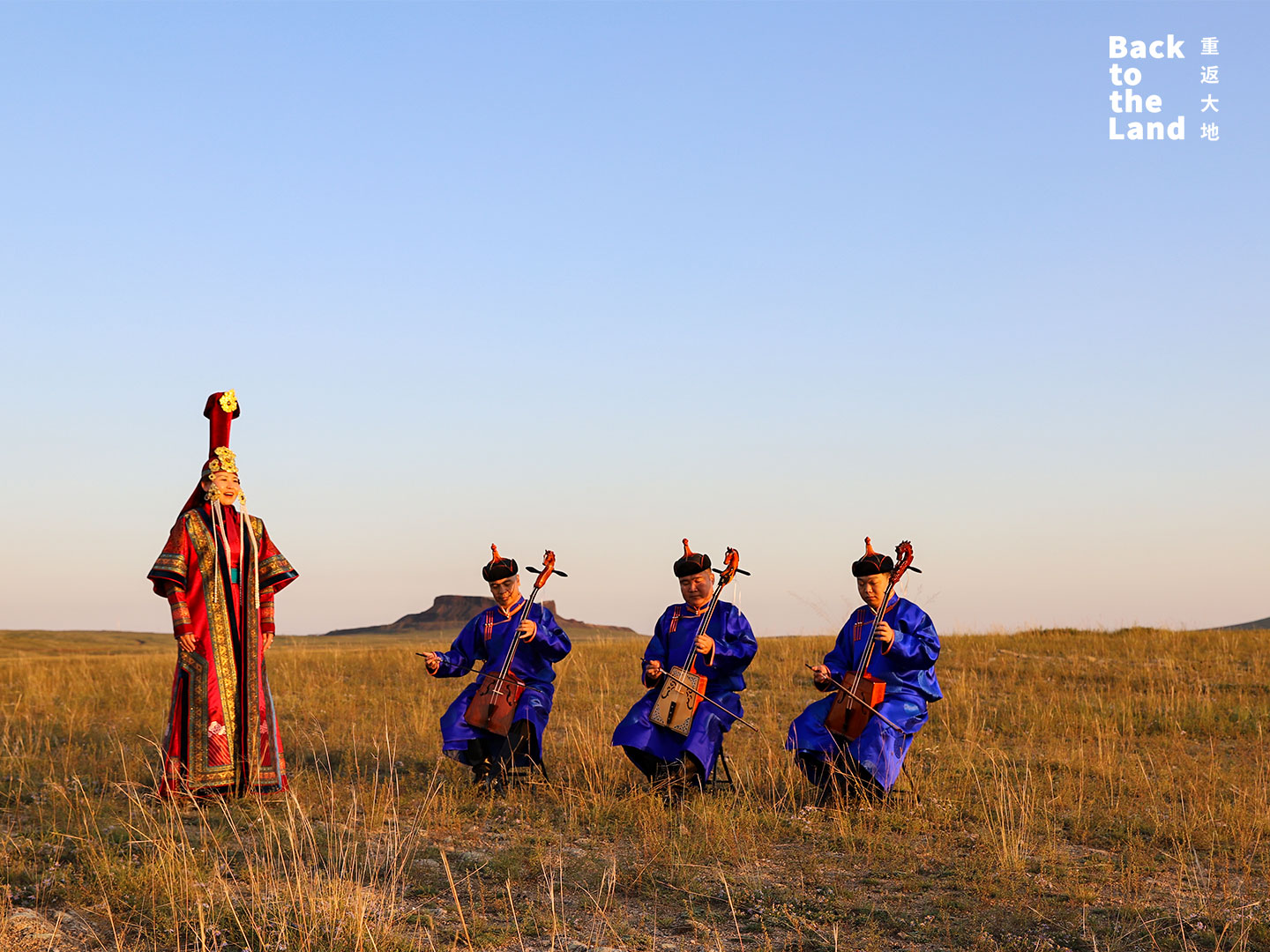 Morin khuur players perform on the grasslands of Inner Mongolia, accompanied by traditional khoomei throat singer. /CGTN