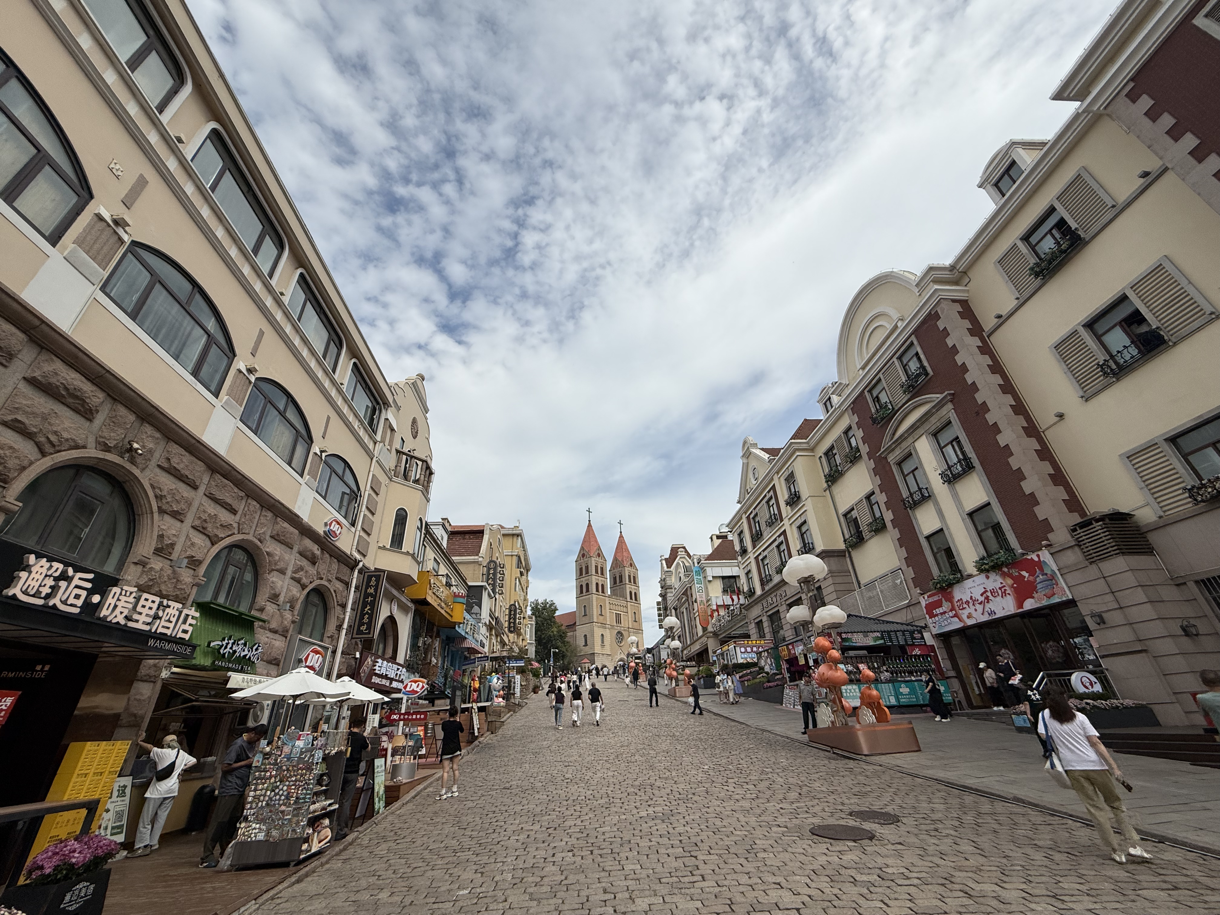 St. Michael's Cathedral, its twin spires rising above the cobblestone slope, viewed from Zhejiang Road in Qingdao, Shandong Province, China, September 2025. Zaruhi Poghosyan /CGTN