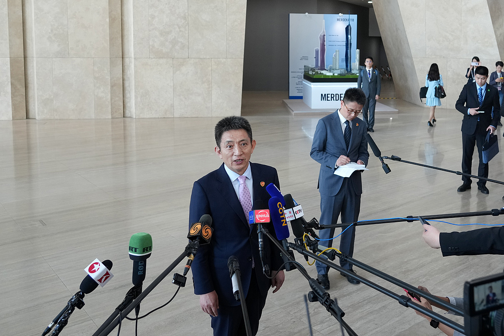 Li Chenggang, China's international trade representative with the Ministry of Commerce and vice minister of commerce, briefed the media after the Chinese and US delegations reached a preliminary consensus, Kuala Lumpur, Malaysia, October 26, 2025. /VCG