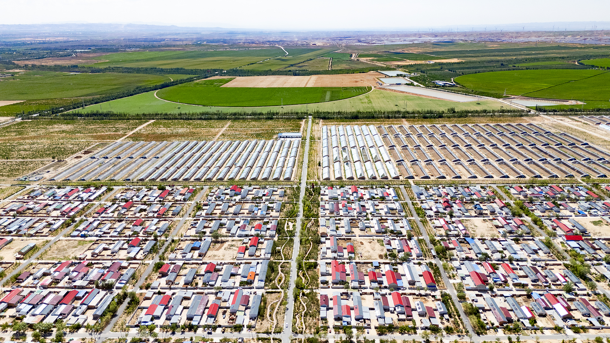 A photo taken in July 2025 shows Hongde Village in Wuzhong, Ningxia Hui Autonomous Region. /VCG