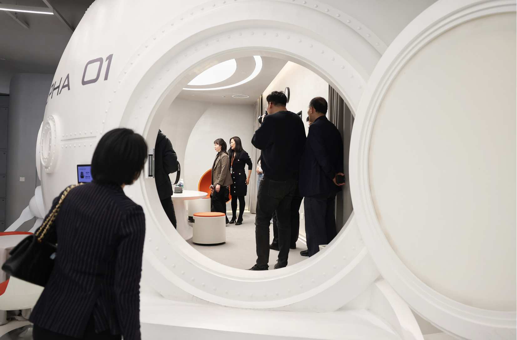 Taiwan compatriots and enterprises visit a space capsule-themed meeting room at the Innovation Incubation Center in Beijing, China, March 12, 2025. /CFP