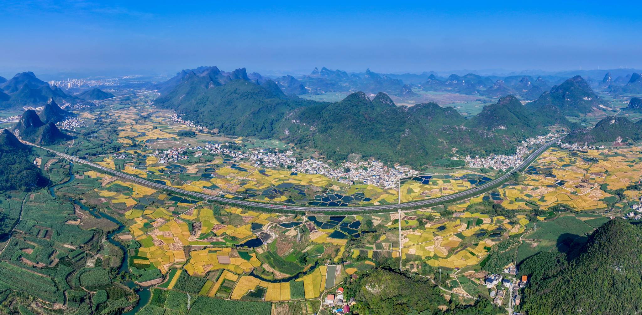 An aerial view of Yangmei Village in Liucheng County, Guangxi Zhuang Autonomous Region, is captured on October 28, 2025. /VCG