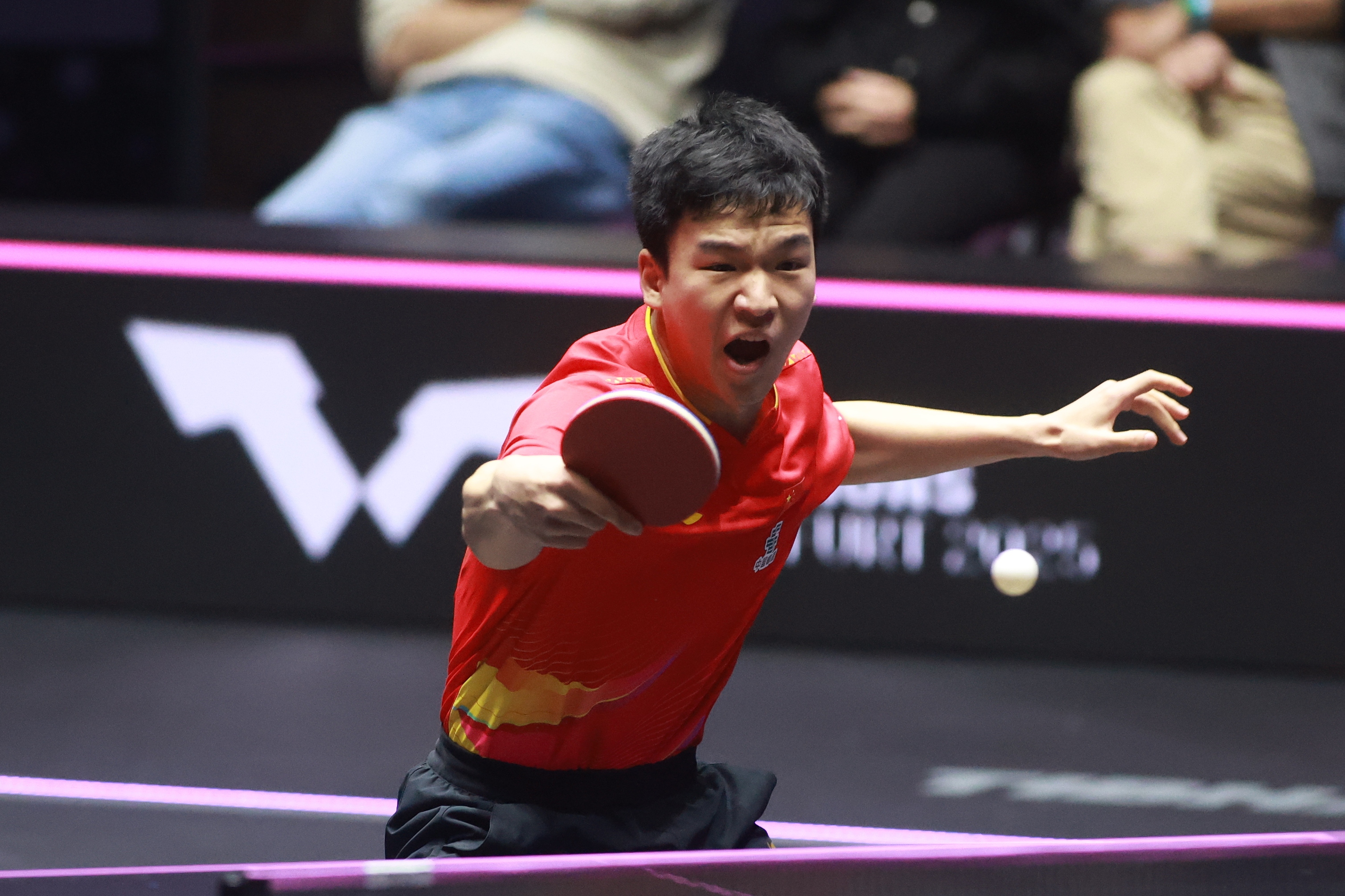 China's Xiang Peng in action during the Men's Singles - Round of 32  against Germany's Patrick Franziska on day two of the WTT Champions in Montpellier, France, October 29, 2025. /VCG