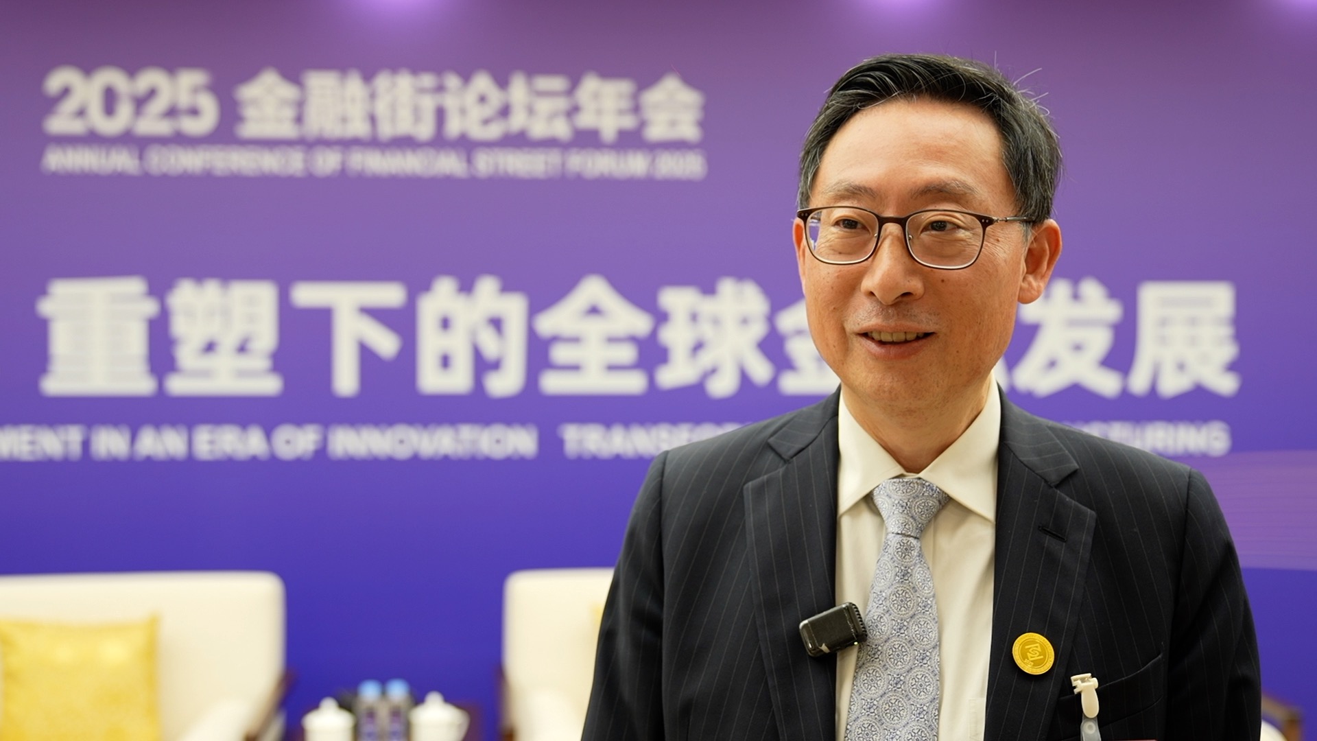 Gene Ma, chief APAC representative and head of China Research at Institute of International Finance (IIF), speaks to CGTN at the 2025 Financial Street Forum, Beijing, China, October 28, 2025. /CGTN