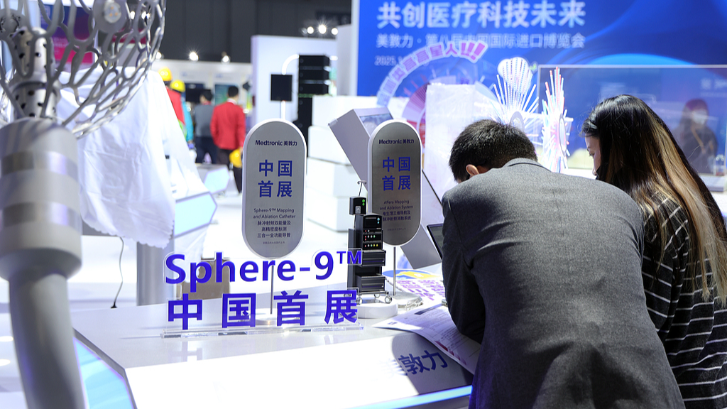 Workers set up the exhibition stand at the National Exhibition and Convention Center (Shanghai), the main venue for the eighth China International Import Expo, in east China's Shanghai, November 1, 2025. /VCG 