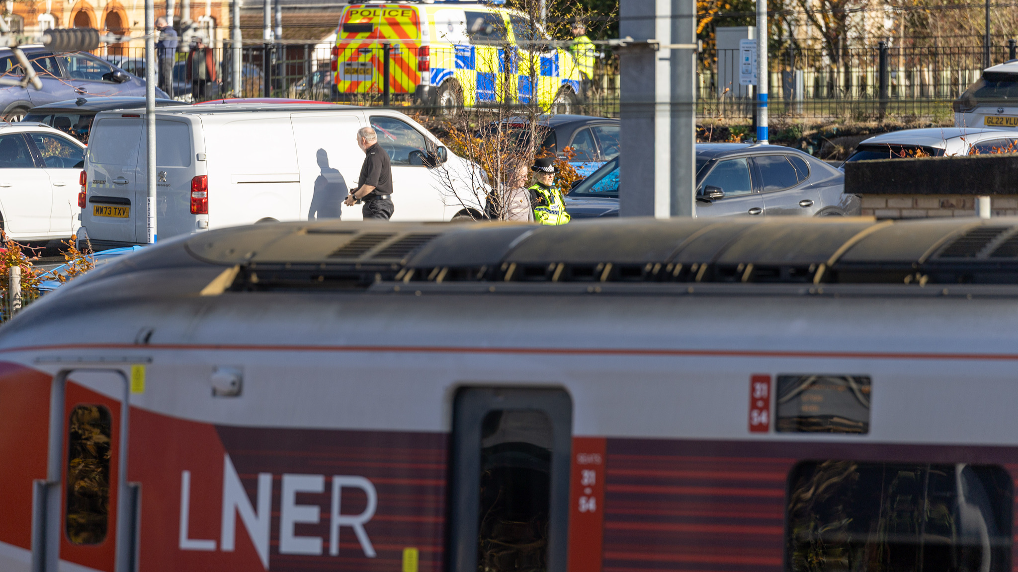 Forensic teams work near the train where 11 people were stabbed during a London-bound journey in Huntingdon, United Kingdom, on November 2, 2025. /VCG