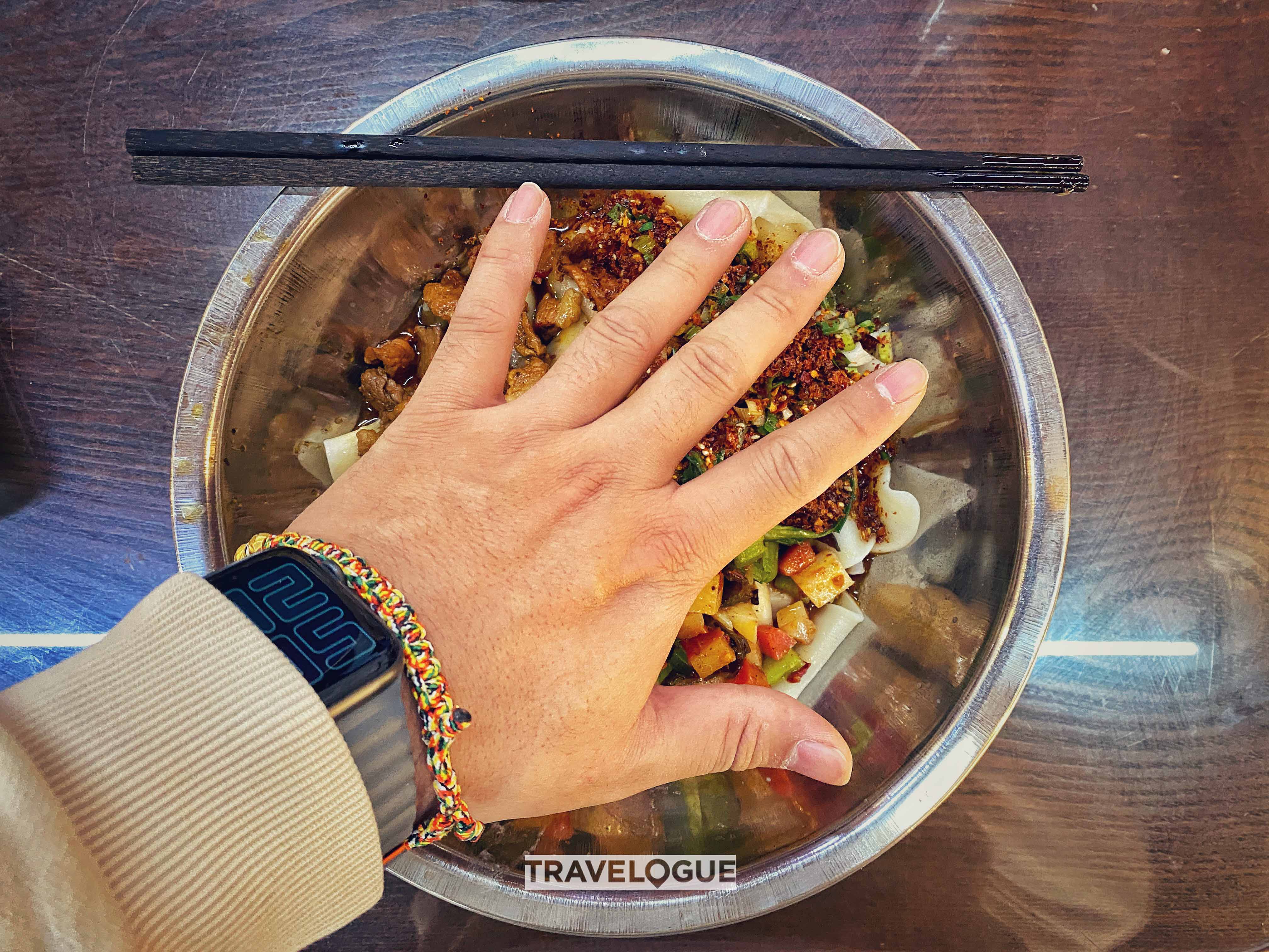 Belt-wide biangbiang noodles from Xi'an. /CGTN